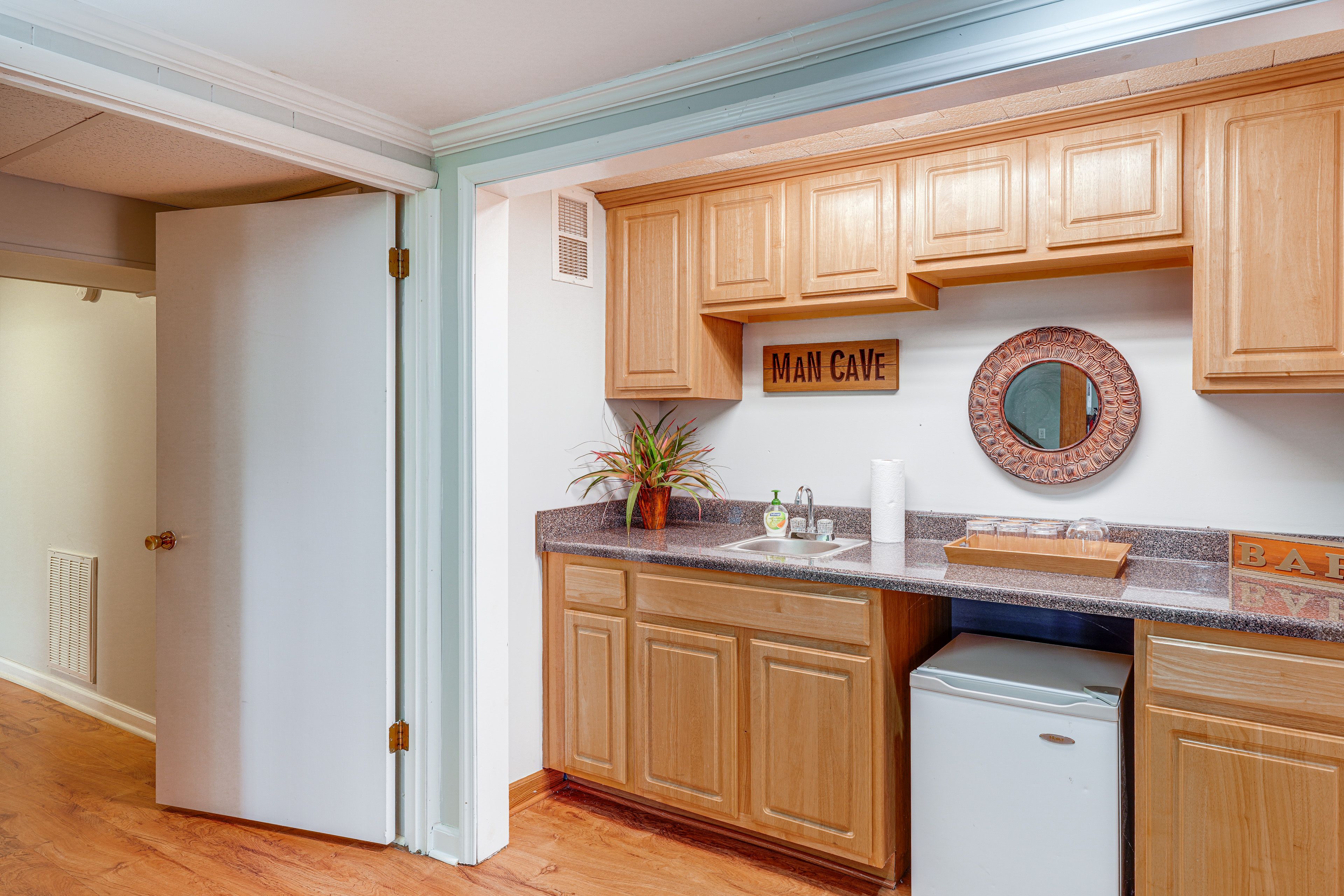 Downstairs Wet Bar w/ Refrigerator & Storage