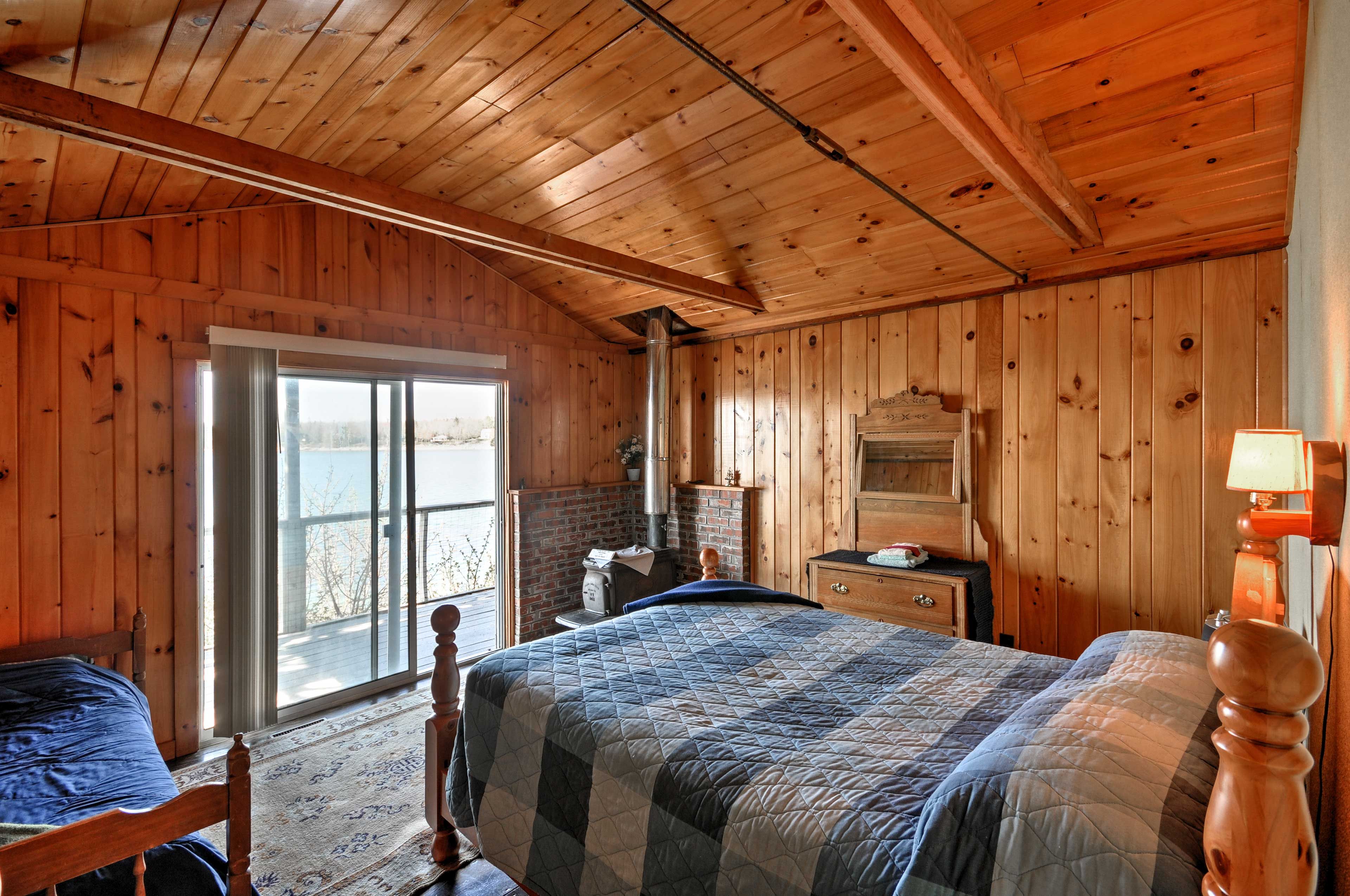 Bedroom 1 | Queen Bed | Twin Bed | Linens Provided | Porch Access
