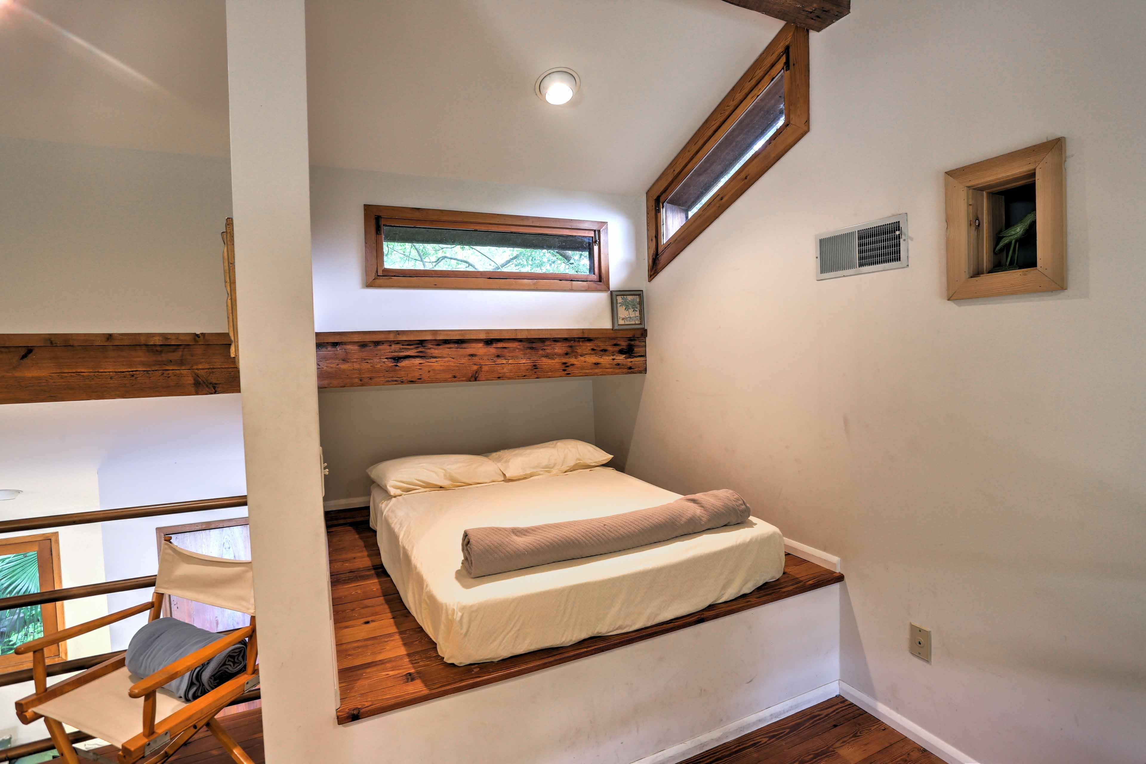 More sleeping can be found on the queen bed in the loft.