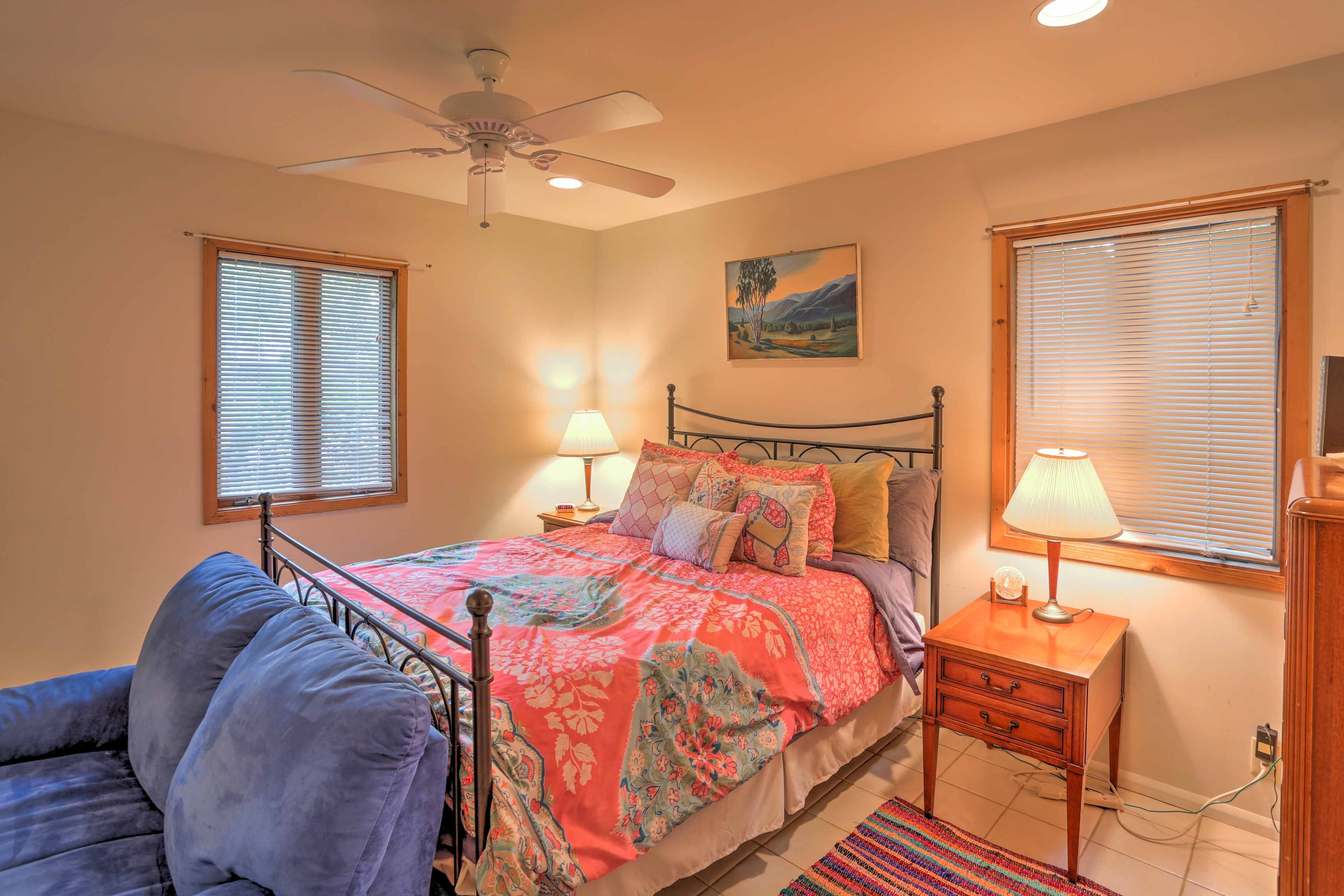 Rest your head on the comfy queen mattress in this bedroom.