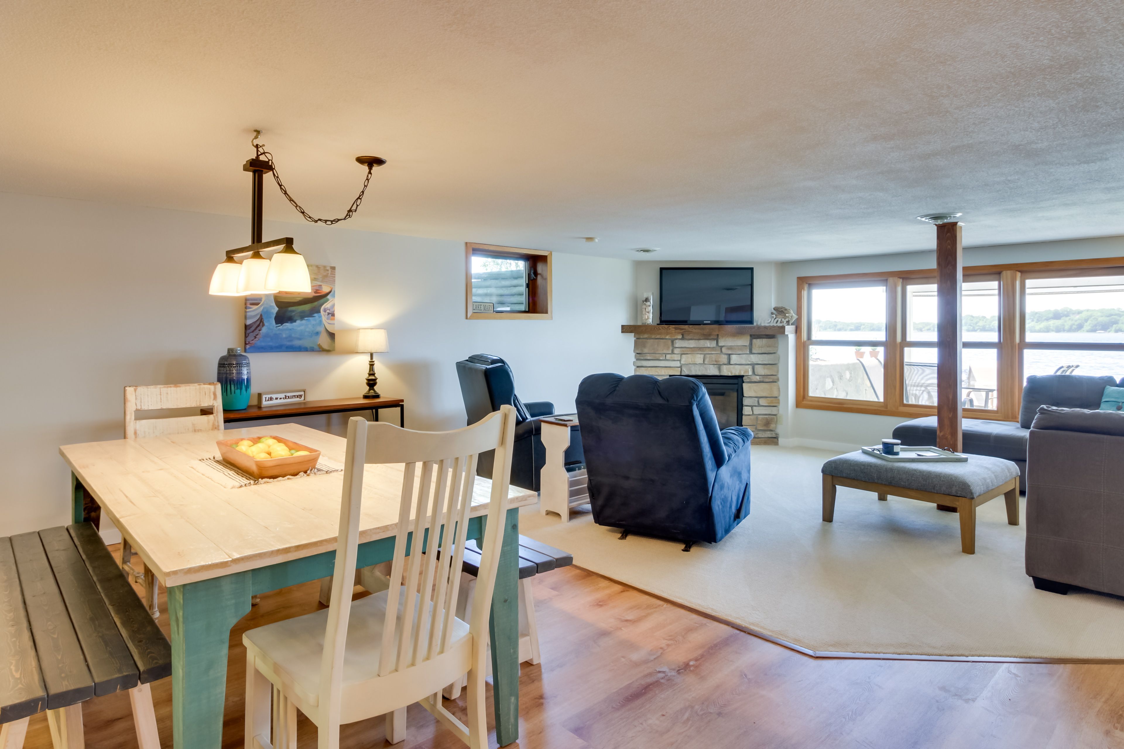 Lower-Level Living Area | Dishware & Flatware | Gas Fireplace | Patio Access