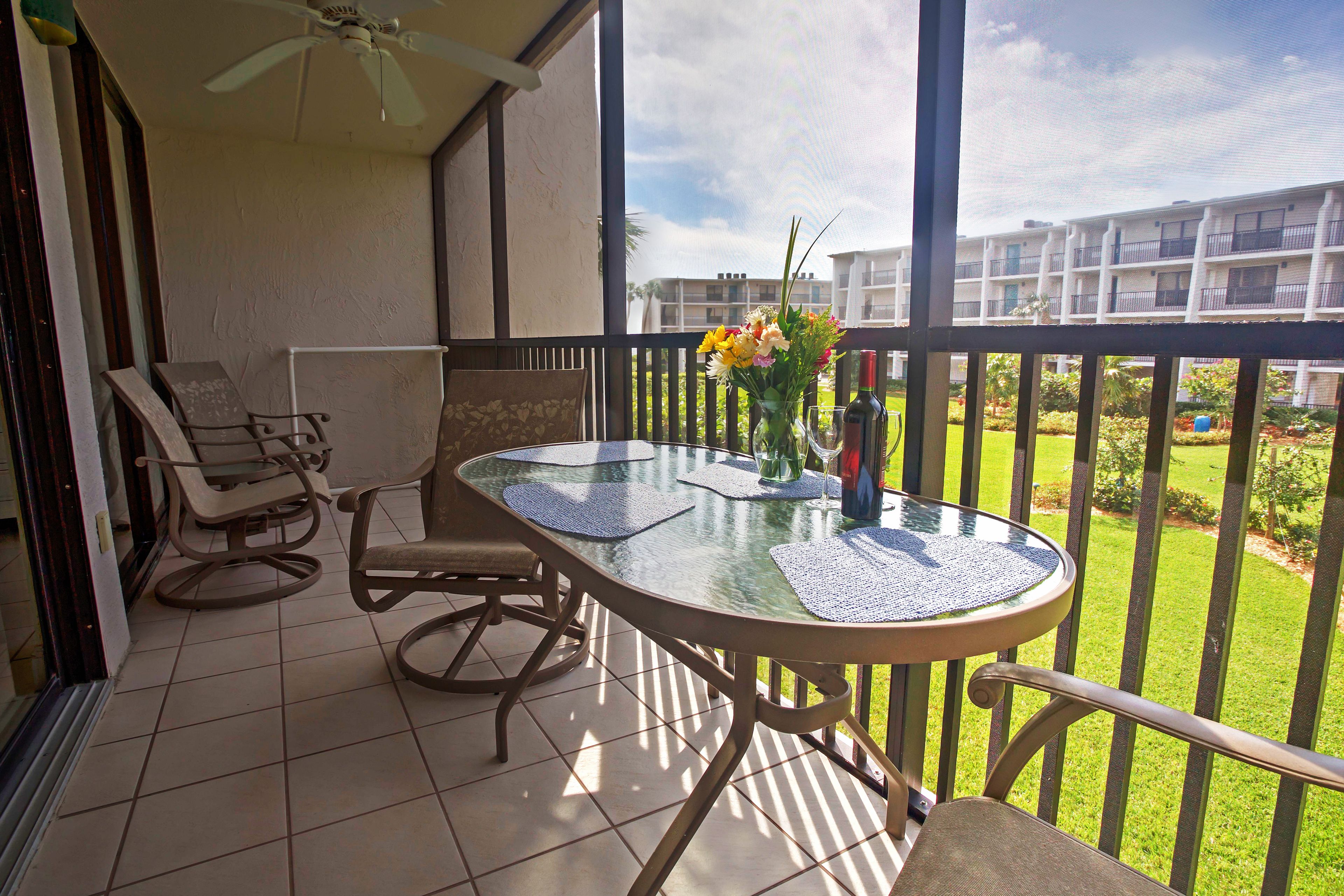 Private Screened-In Balcony | Dining Table | Garden Views