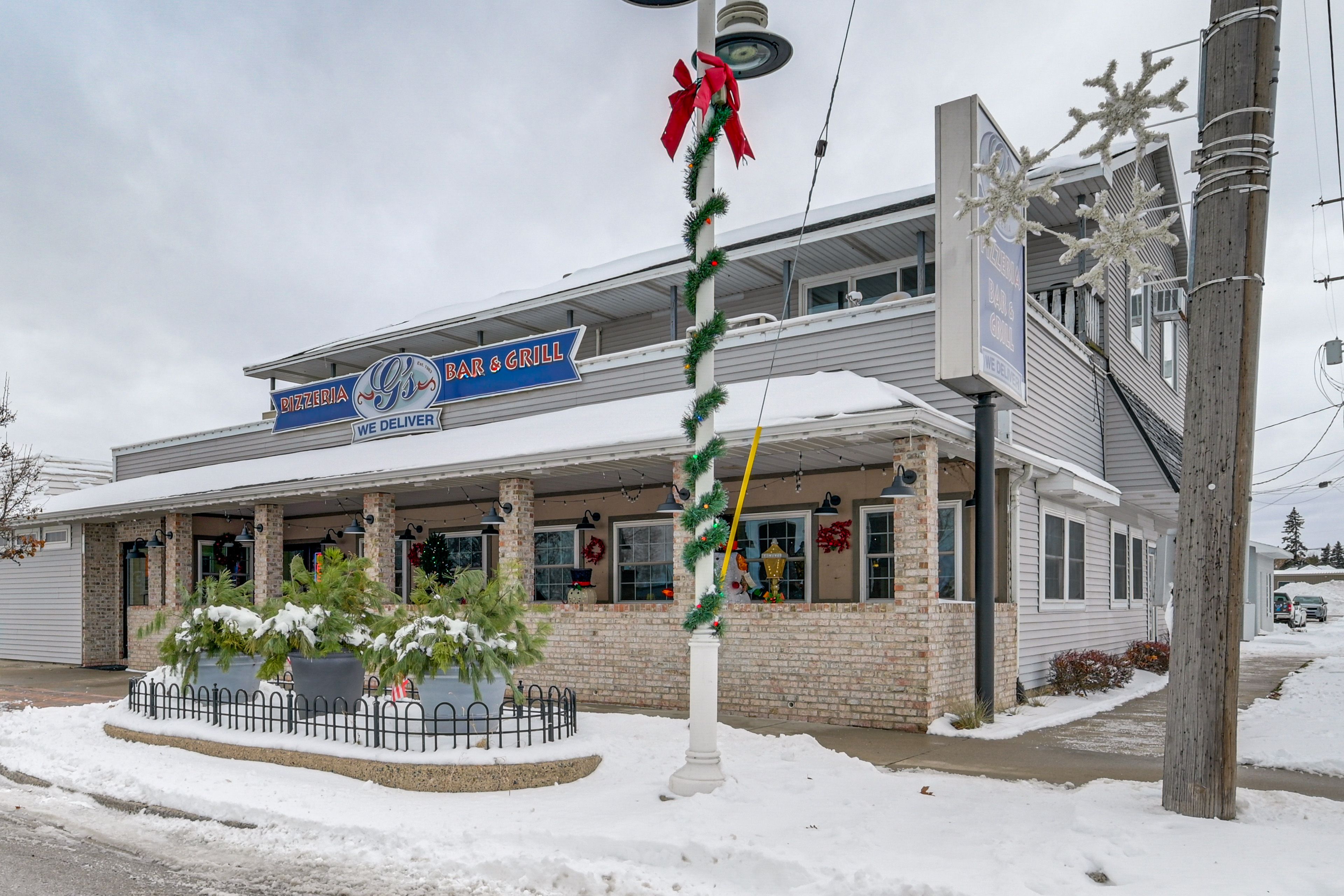 Exterior | Located Above Pizzeria | Parking | Parking Lot (3 Vehicles)