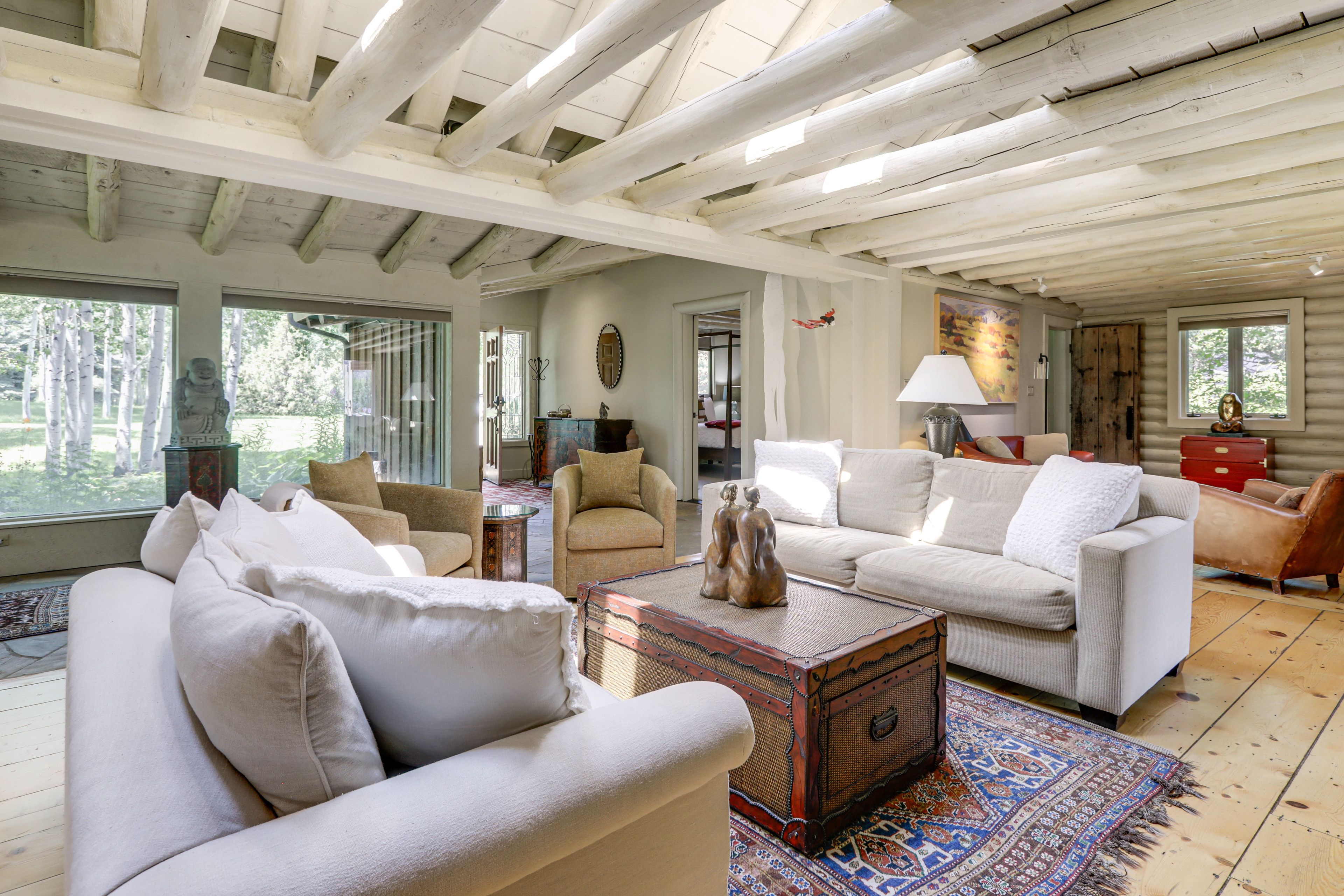 Living Room | Open Floor Plan | Picture Windows | Free WiFi | Stone Fireplace