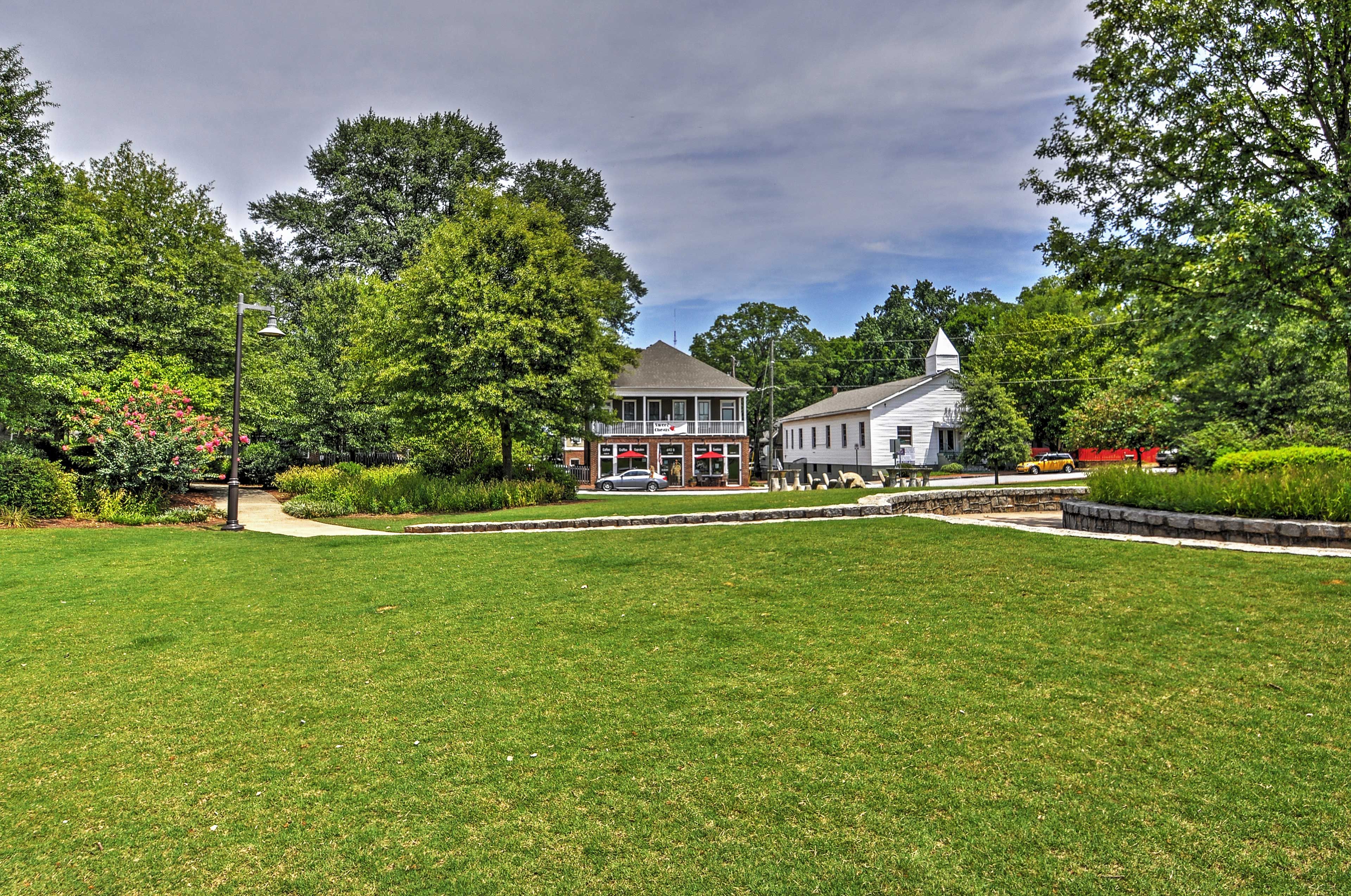 Vibrant landscape surrounds the property.