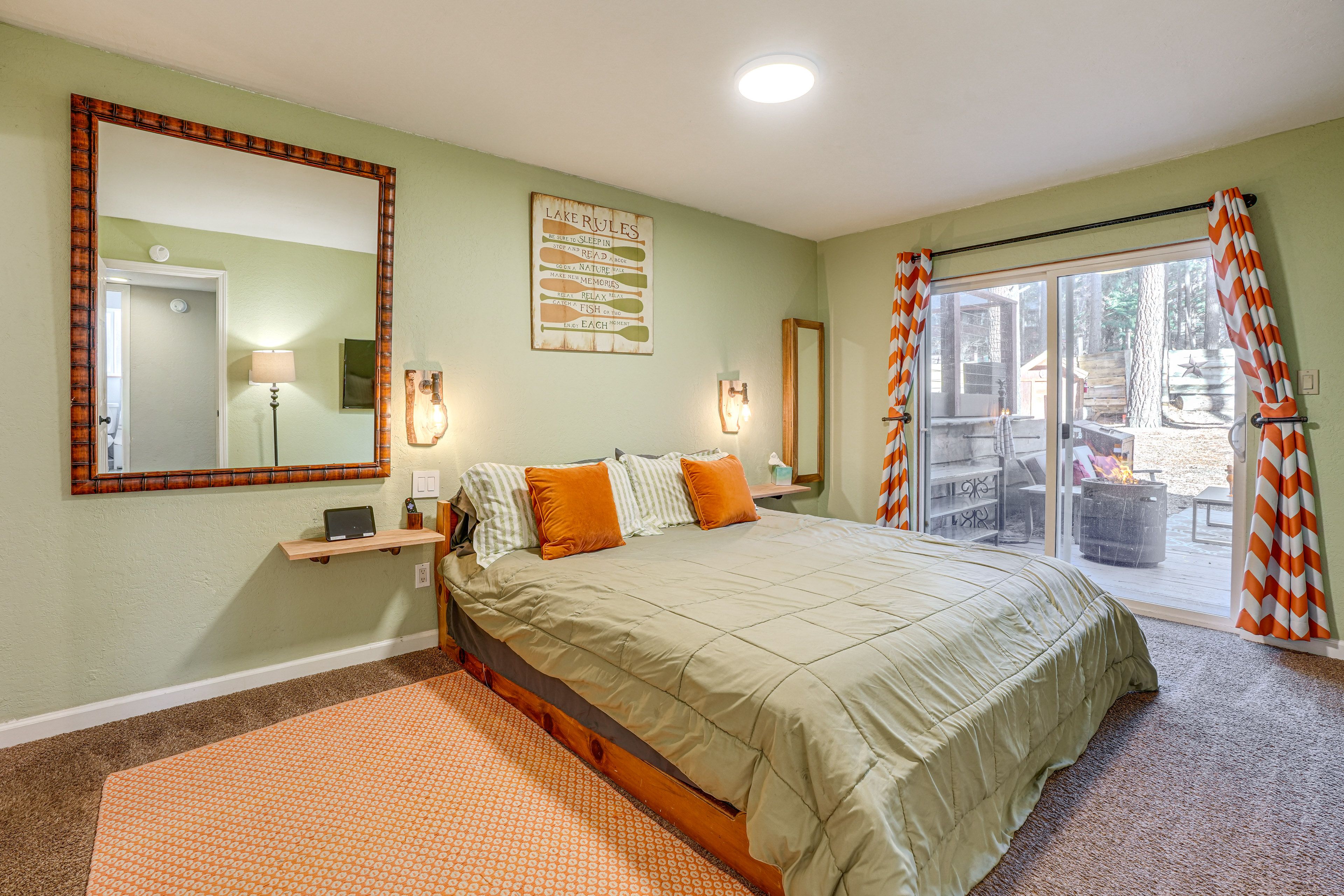 Bedroom 1 | King Bed (w/ Firm Pillowtop Mattress) | Access to Deck | 1st Floor