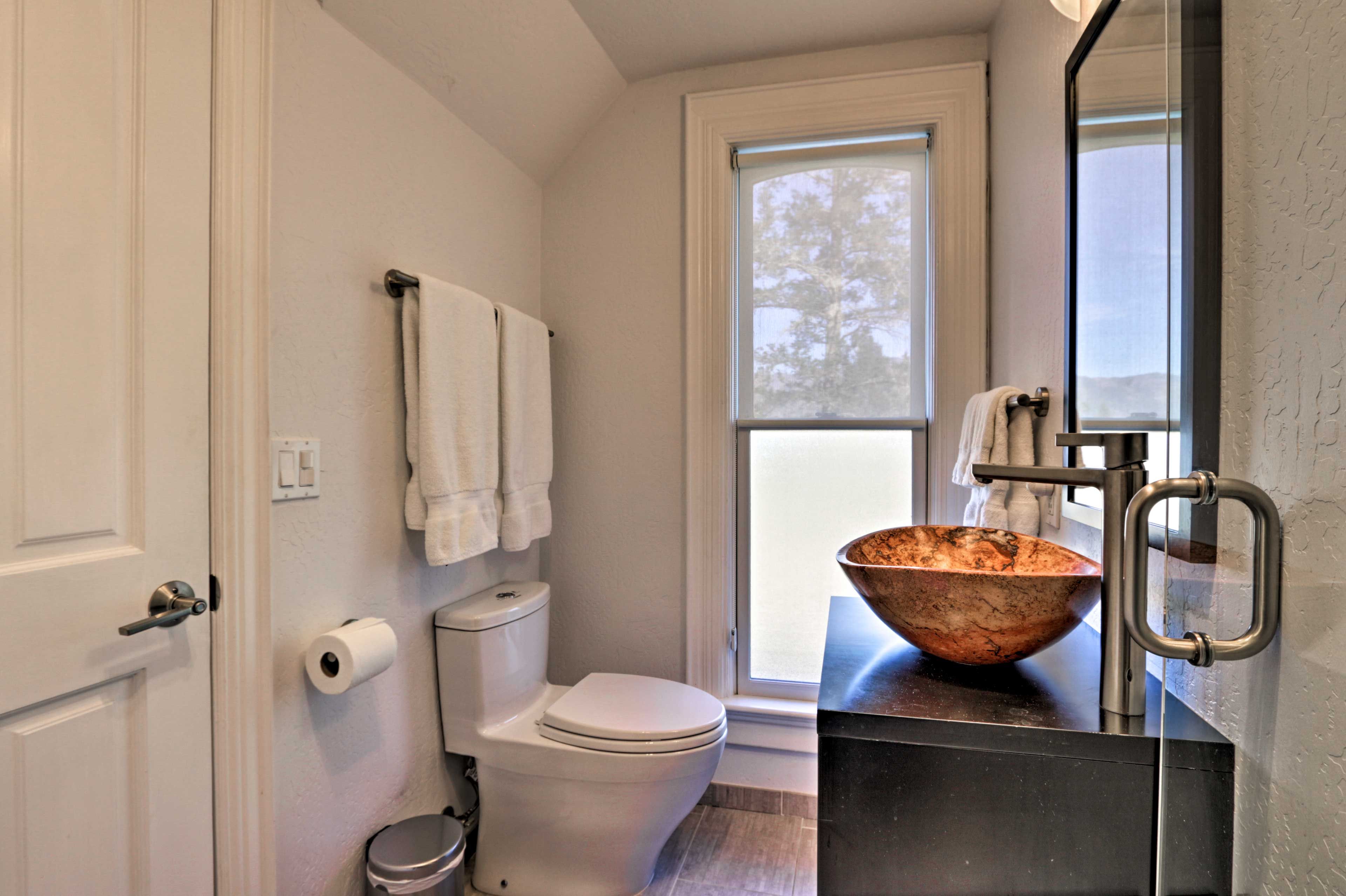 Several bathrooms provide plenty of privacy.
