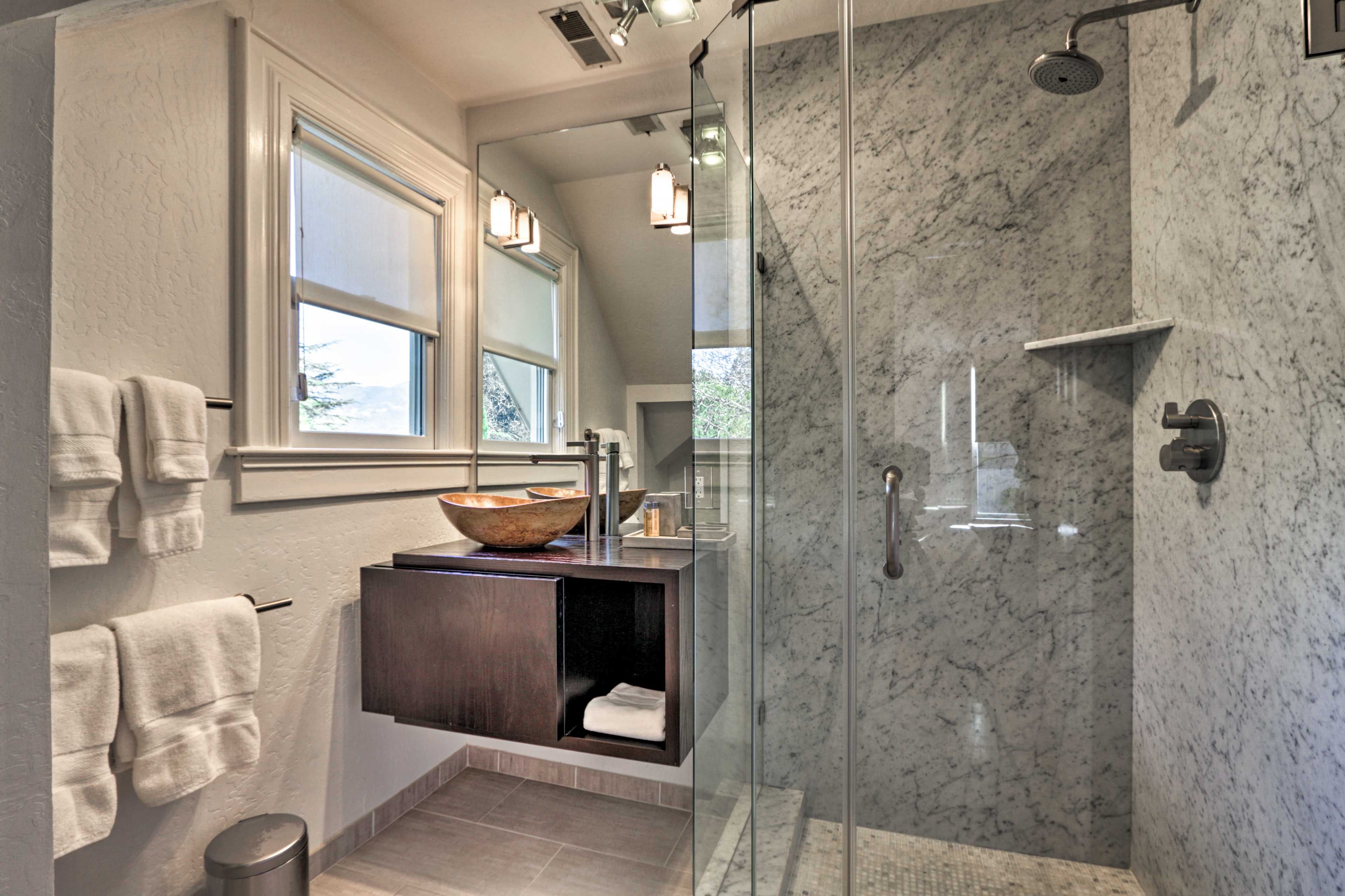 Enjoy a warm shower and dry off with fresh towels.