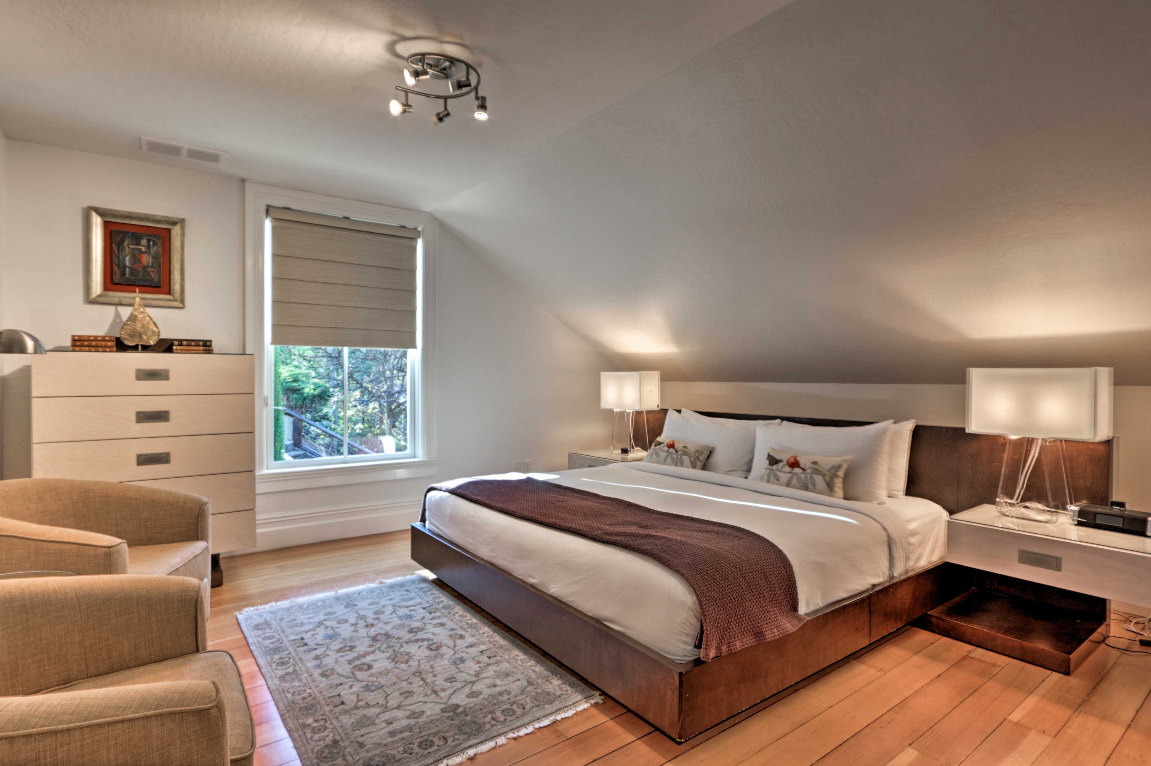 This plush bed invites 2 to sleep in luxurious comfort.