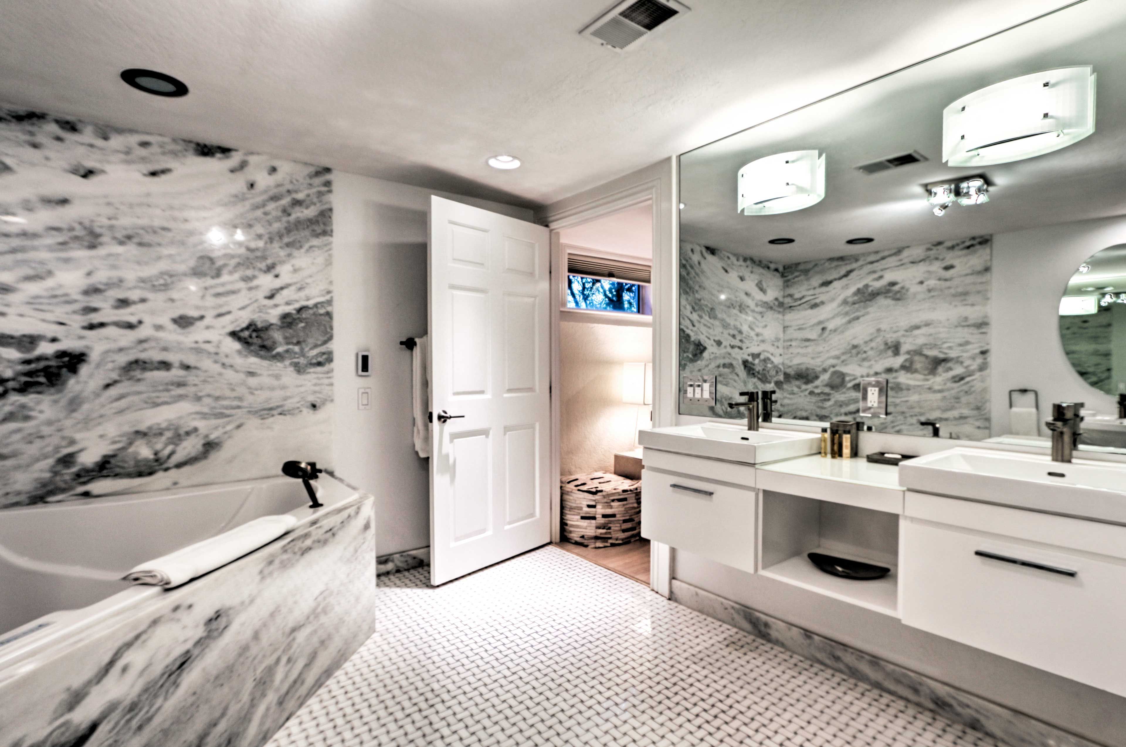 There's double sinks, a luxurious jetted tub and more.