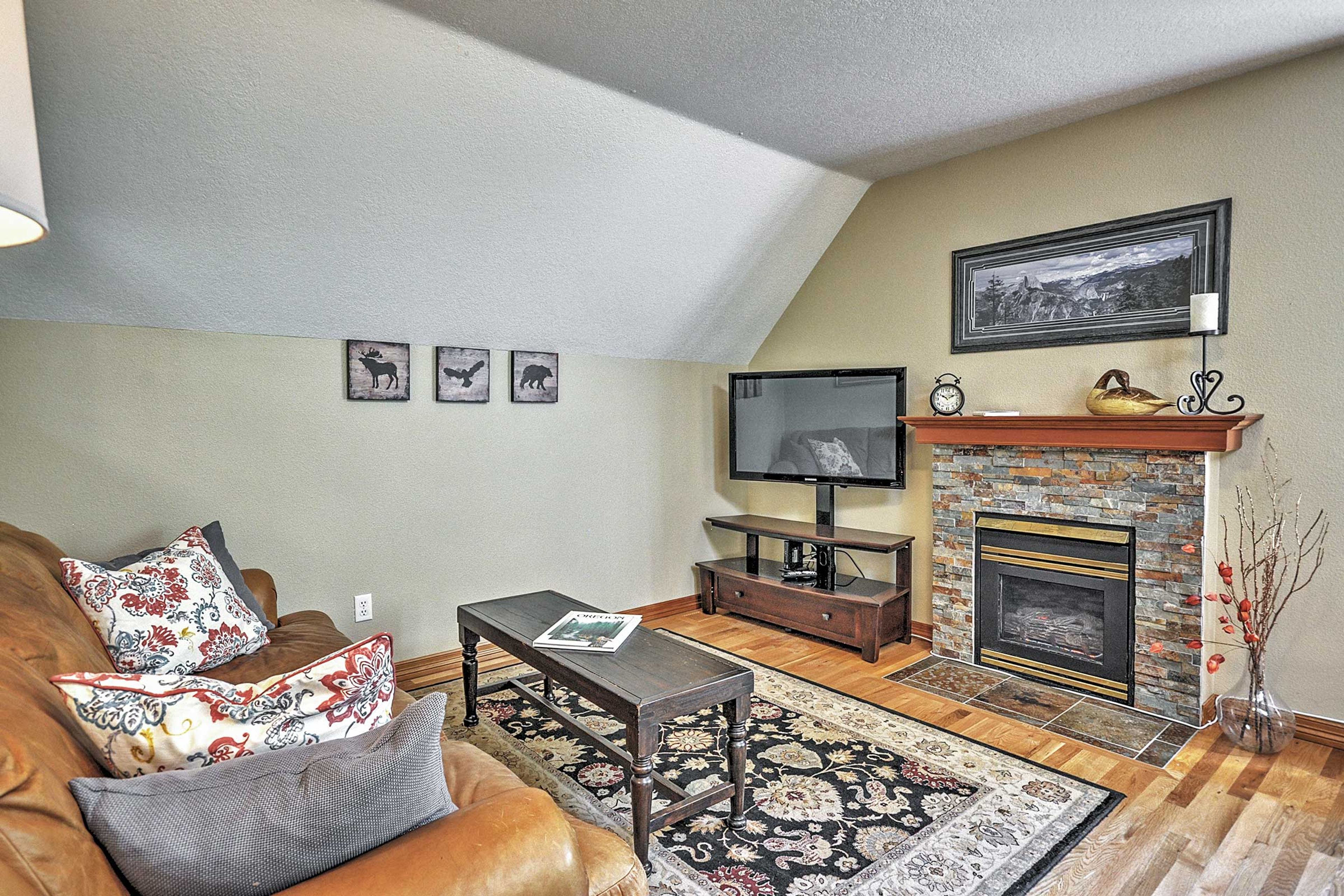 Cozy up next to the gas fireplace in the living room.