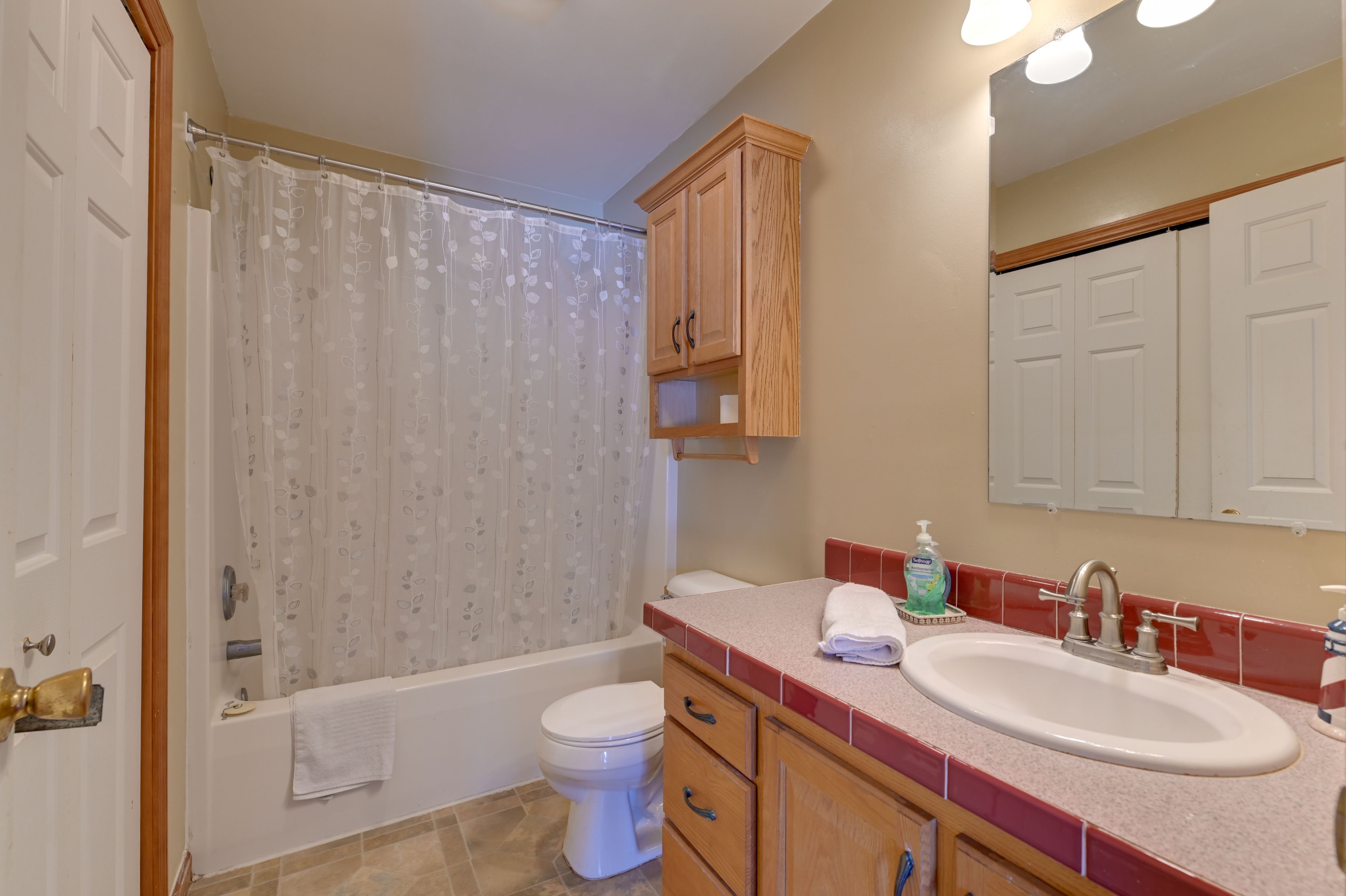 Bathroom | In-Unit Laundry | Iron & Board | 1st Floor