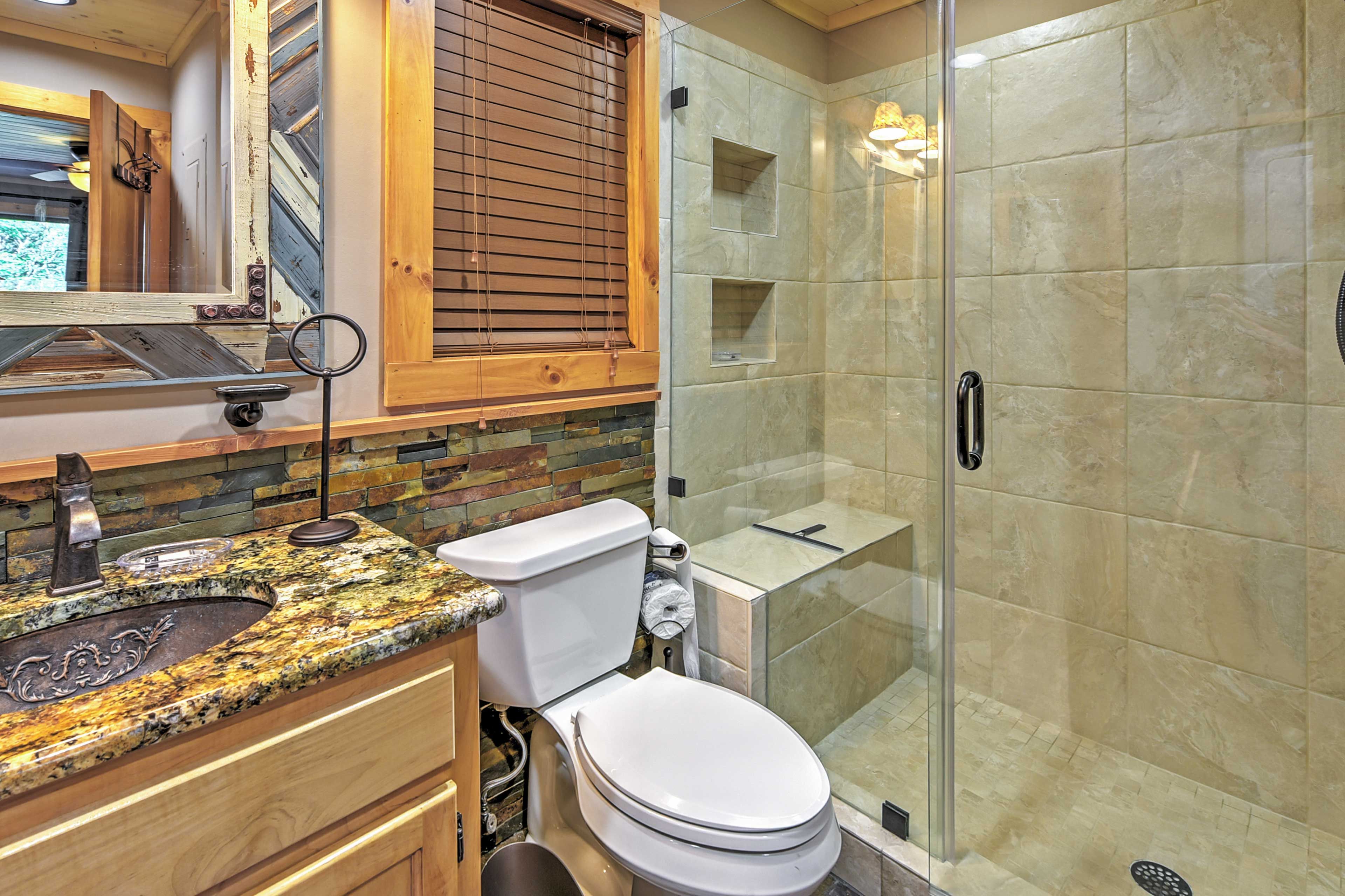 The bathroom comes stocked with fresh towels.