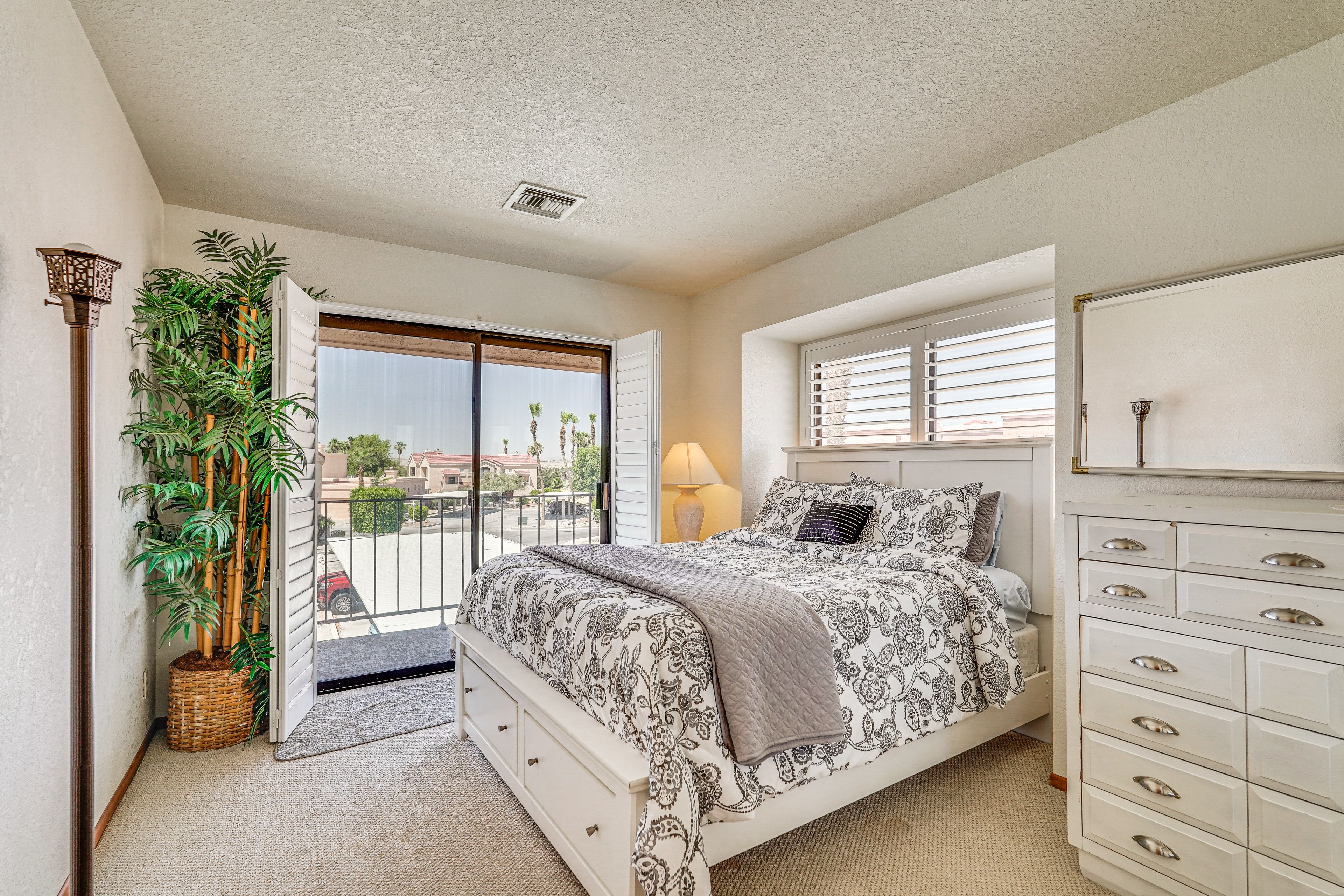 Bedroom 1 | King Bed | Private Balcony | Pool Views