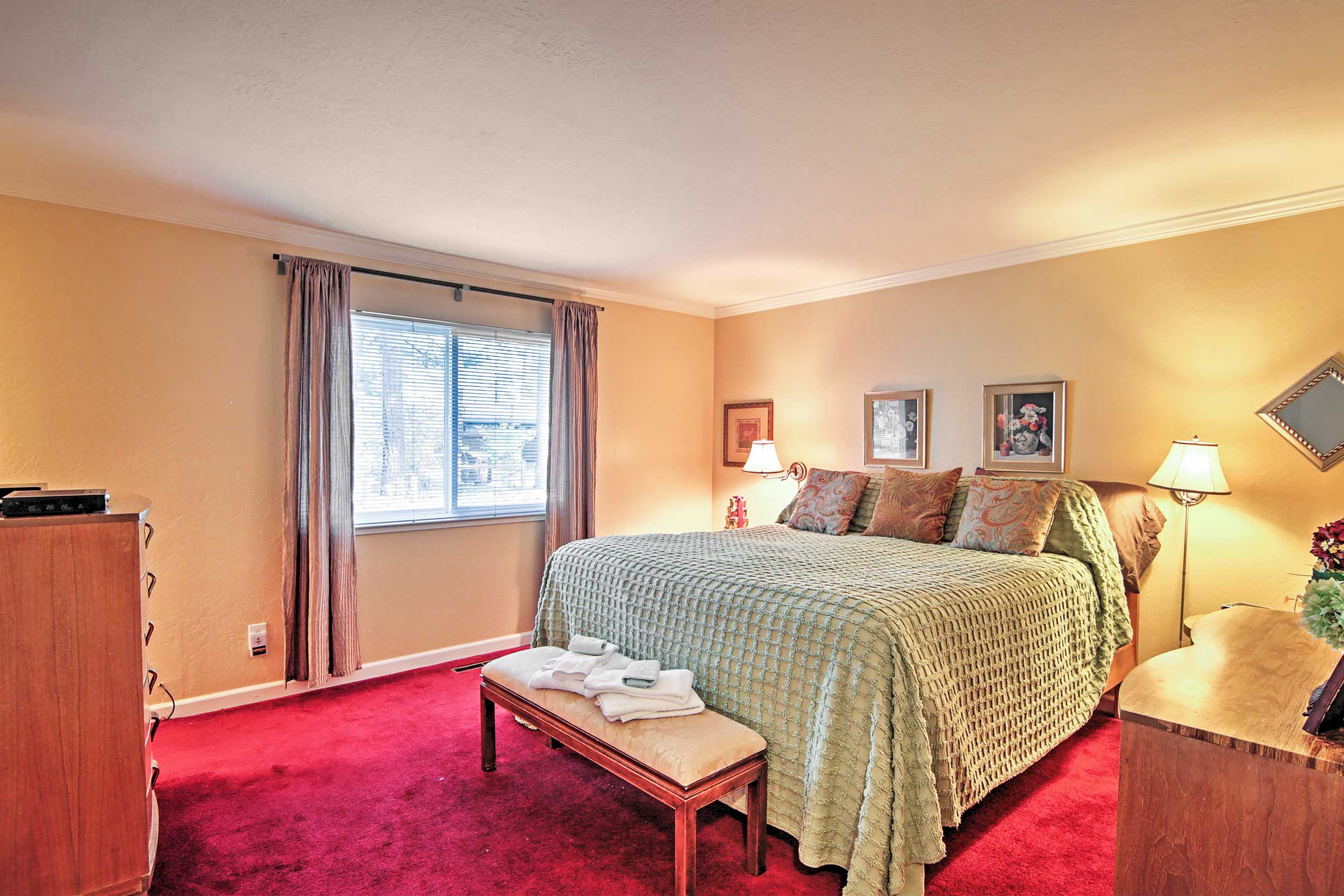 You'll sleep like royalty on this plush California king-sized bed.