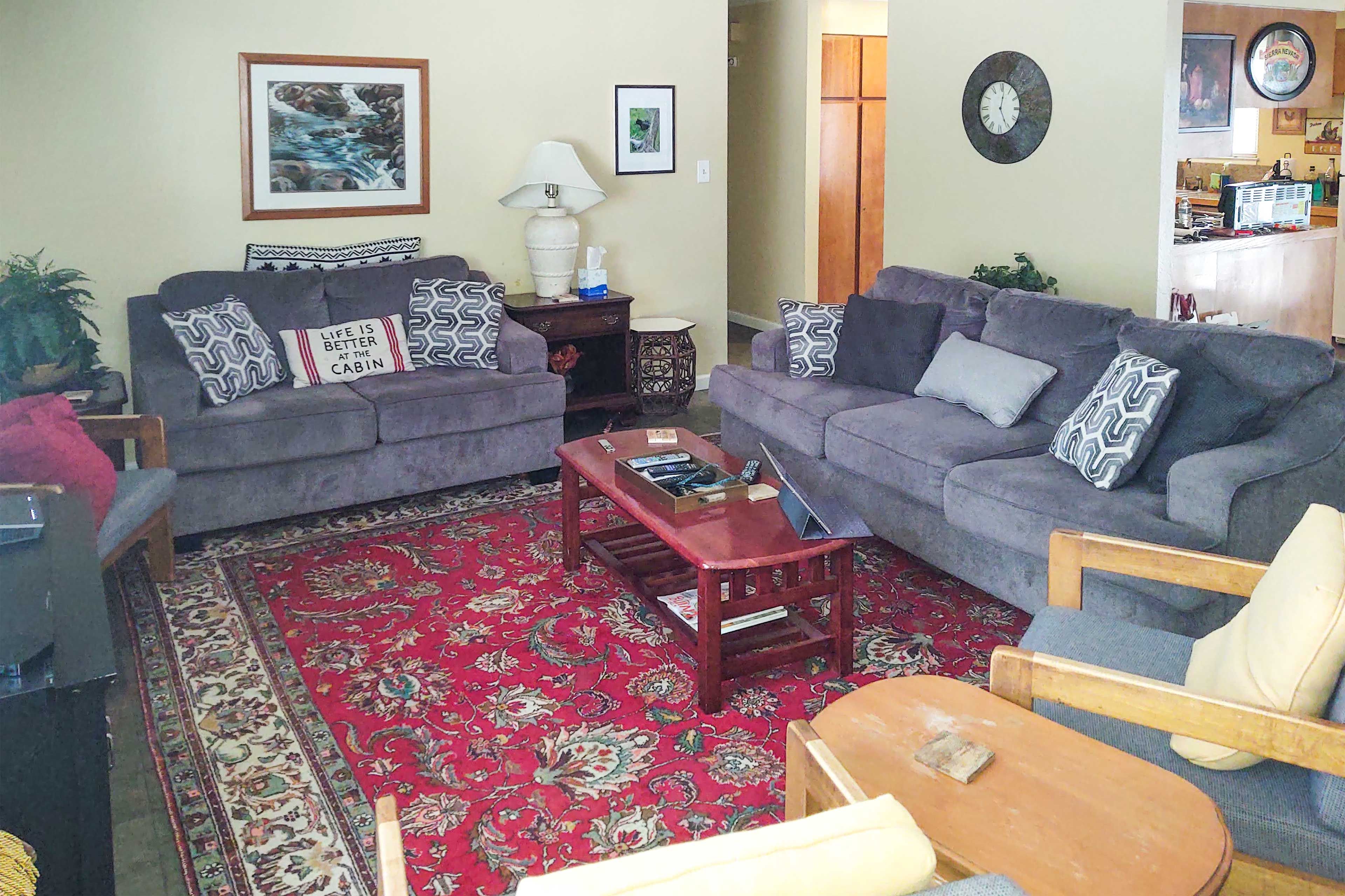 Kick back in the living room with a warm fire radiating in the brick fireplace.