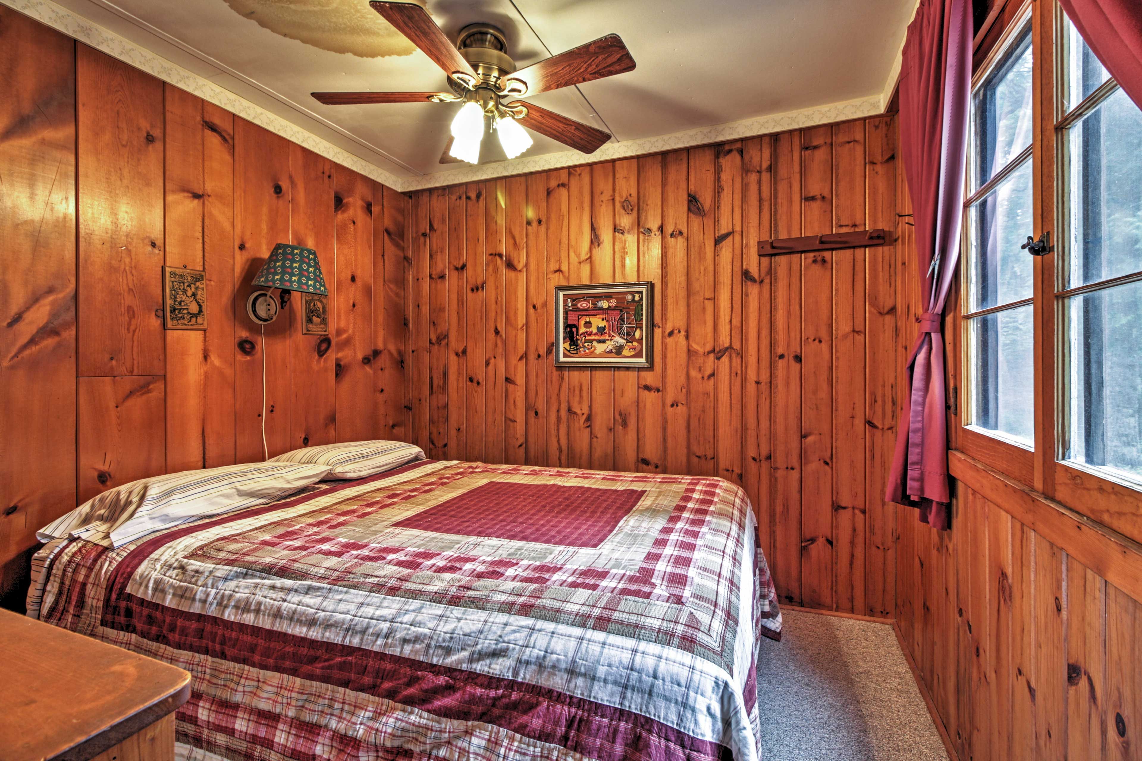 Get a great night's sleep in this rustic bedroom.