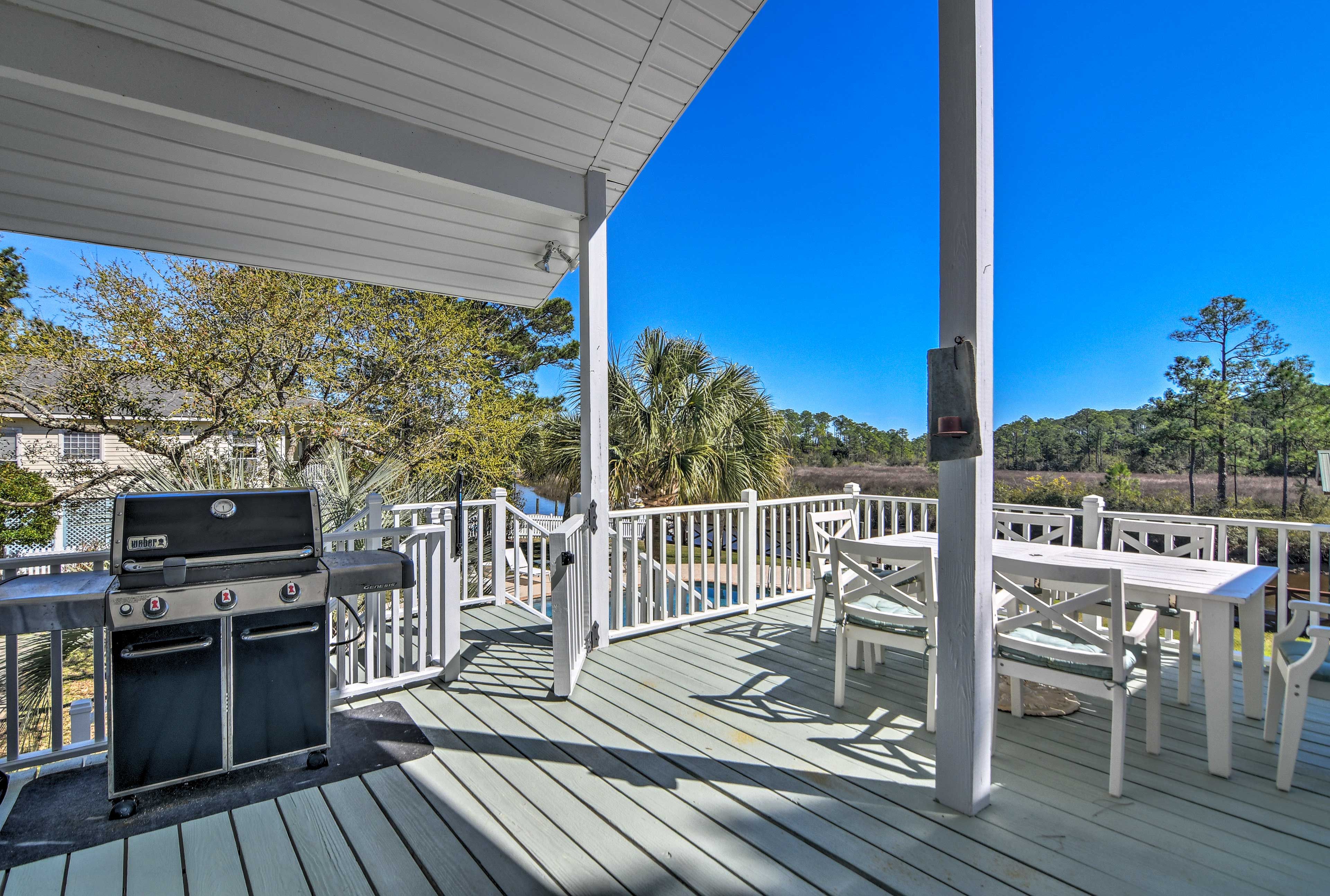 Utilize the gas grill for a poolside cookout.