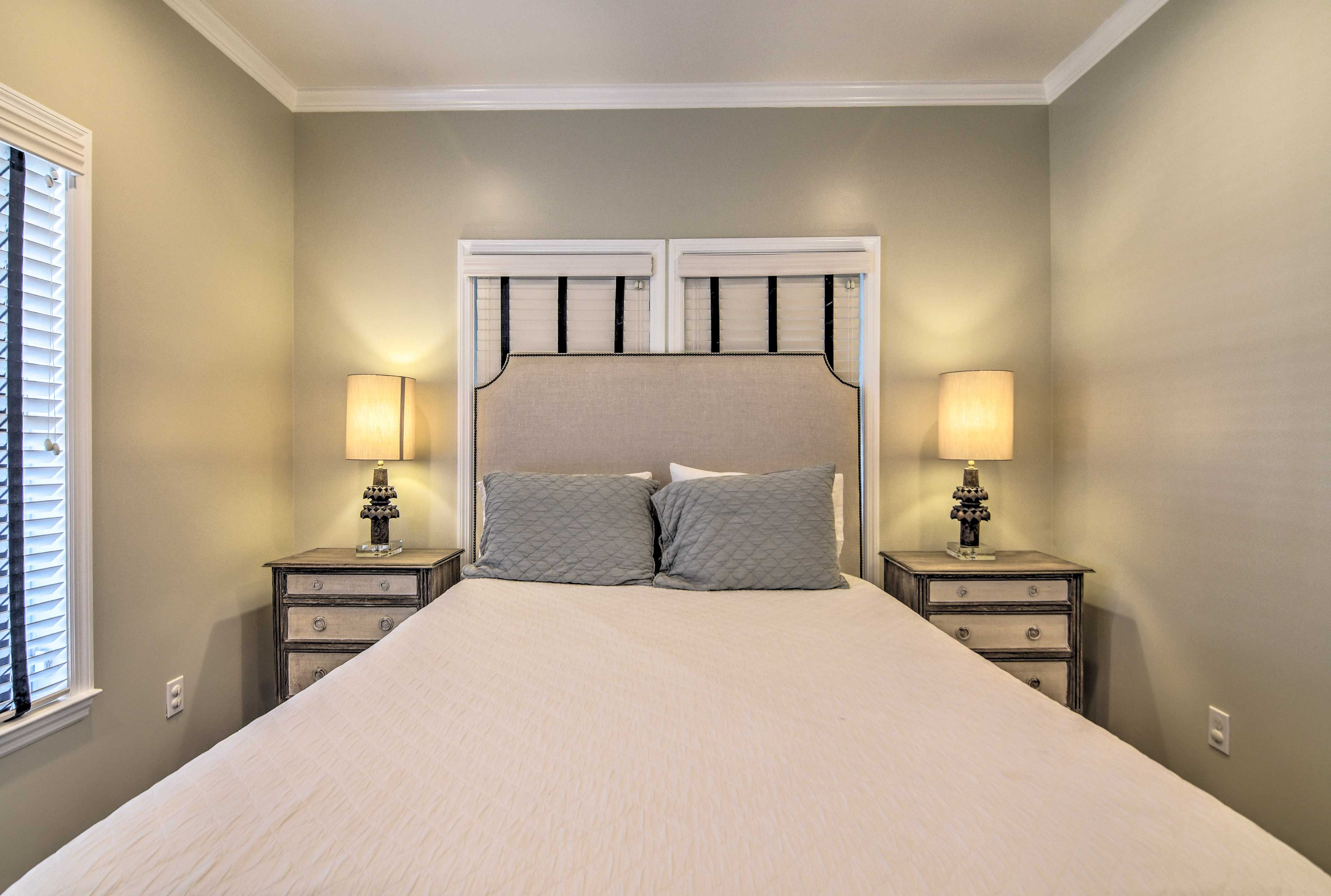 This next bedroom contains a queen-sized bed.