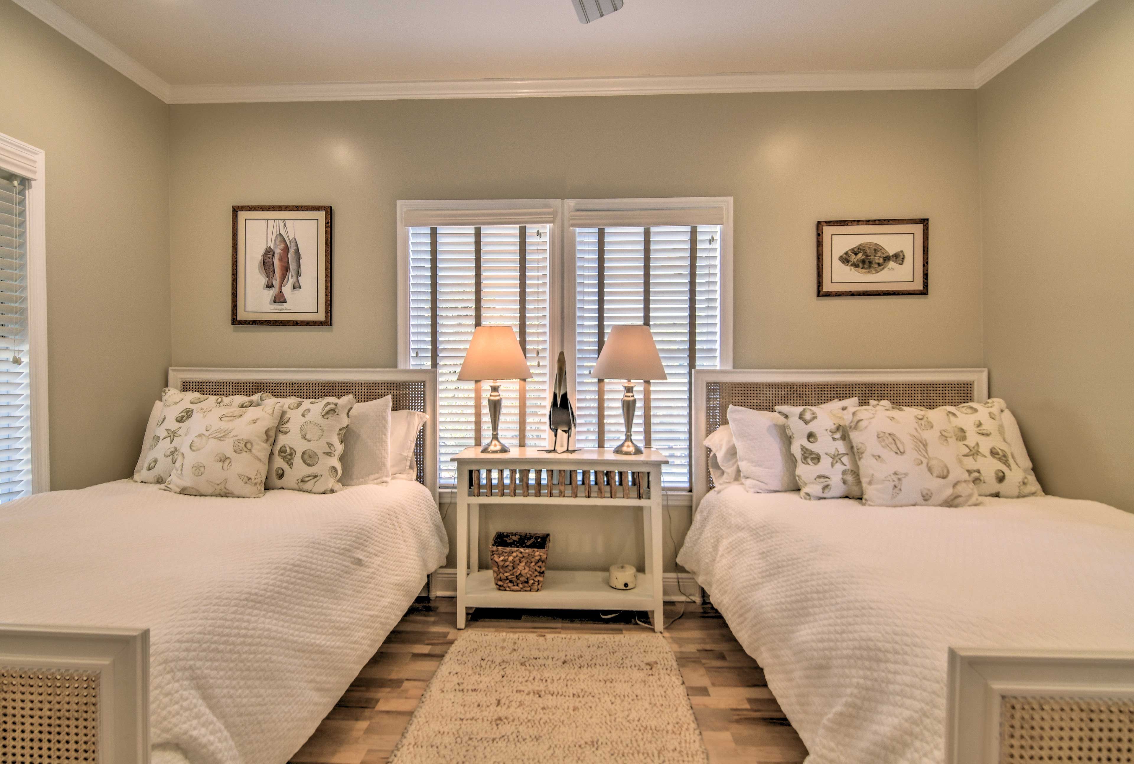 The third and final bedroom includes 2 full-sized beds.