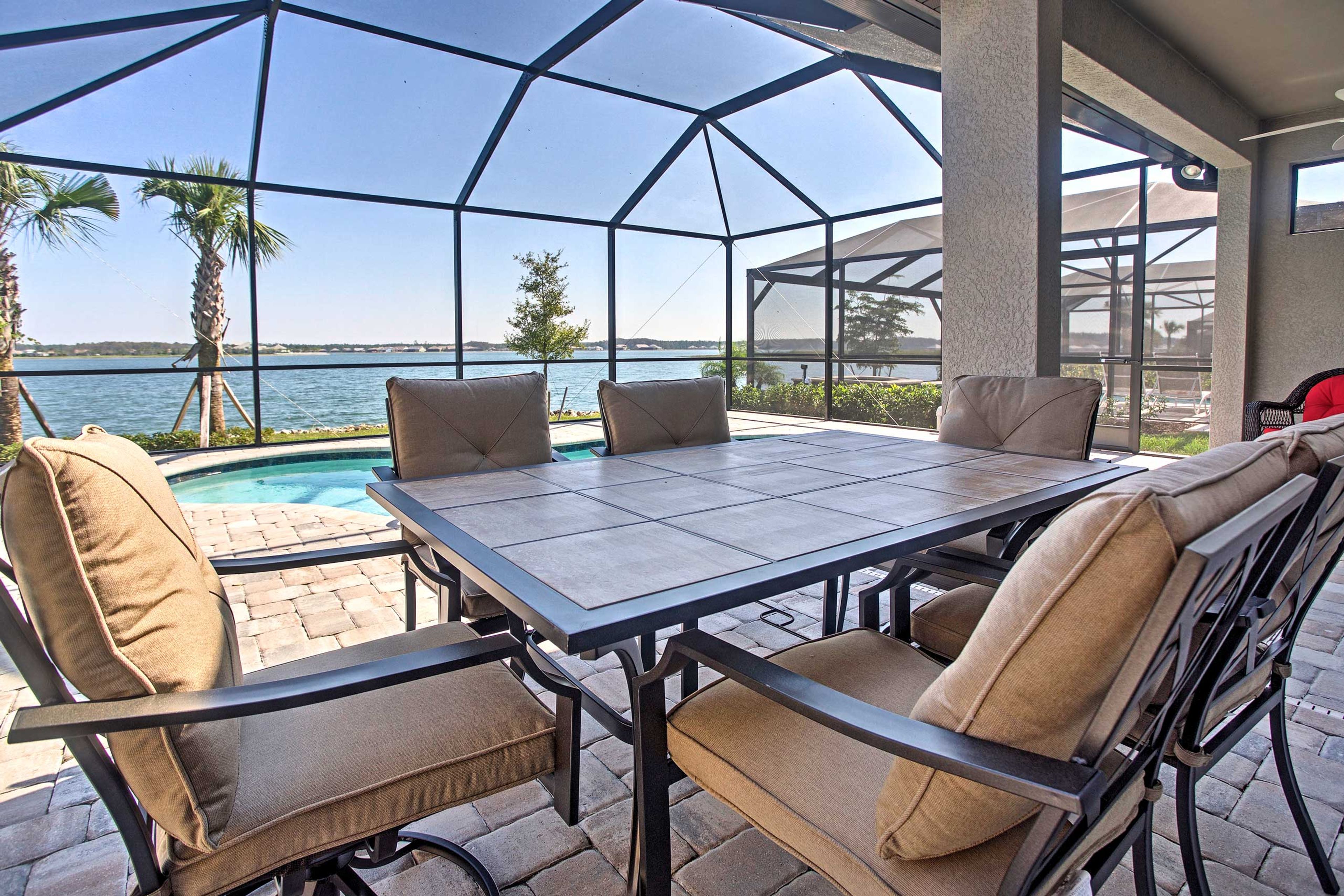 Covered patio is the perfect place to enjoy the view.