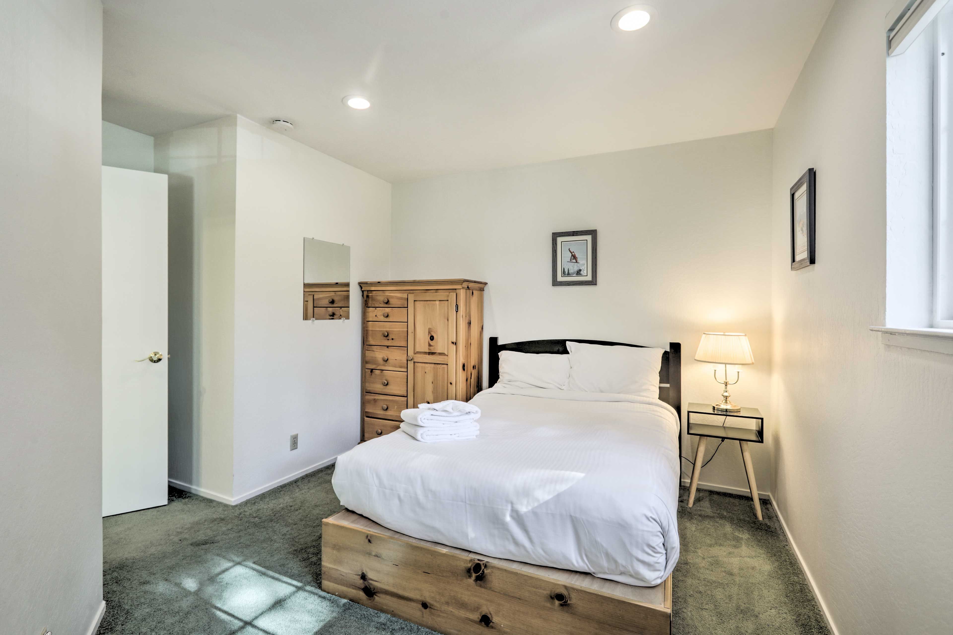 Sleep will come easily in this queen bed.