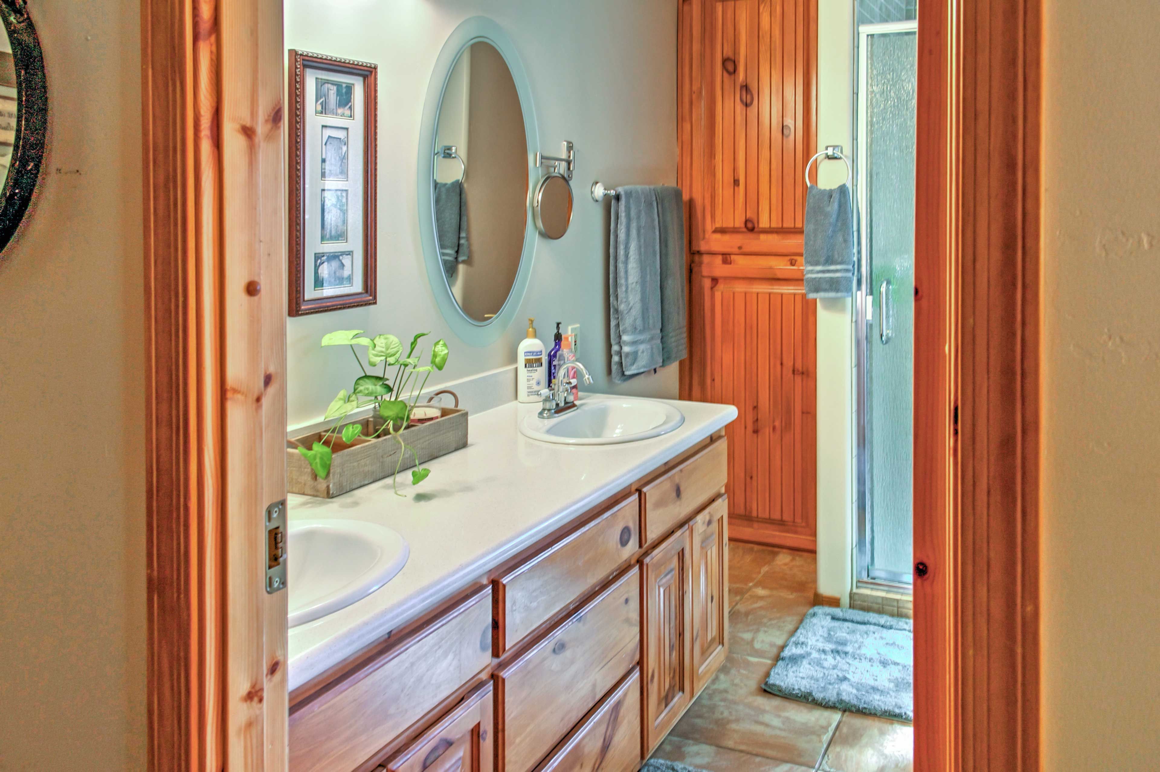 Wash up in this bathroom with double vanities.