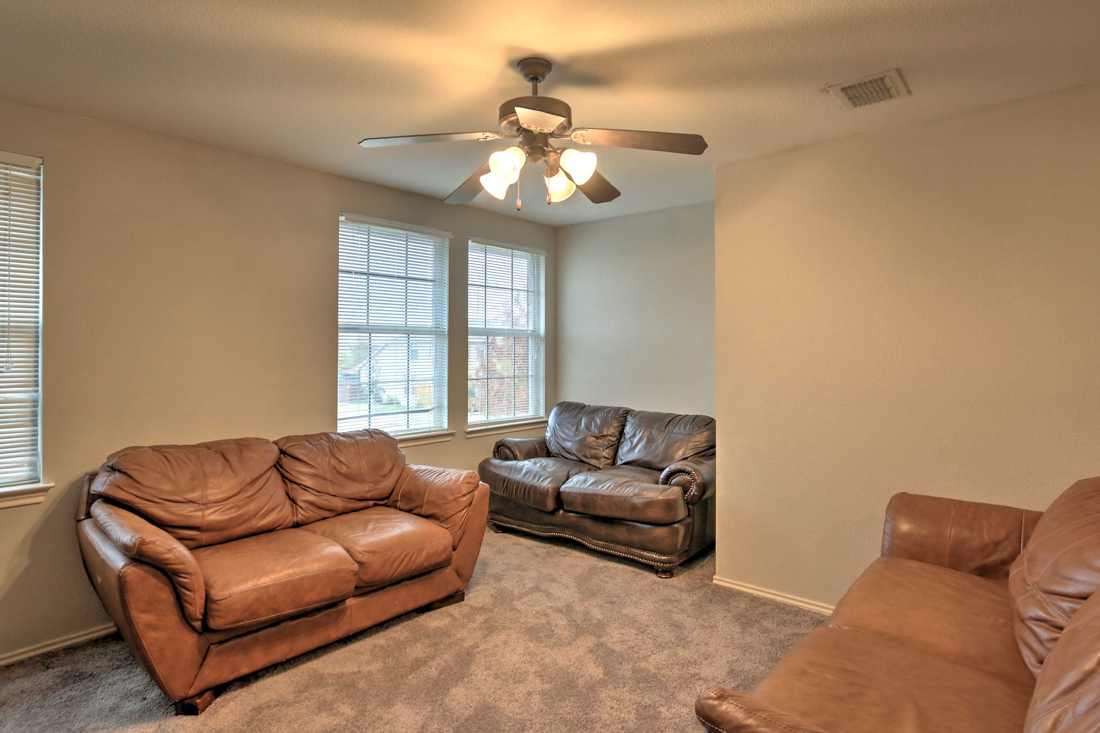 Sit back and relax on the leather loveseat!
