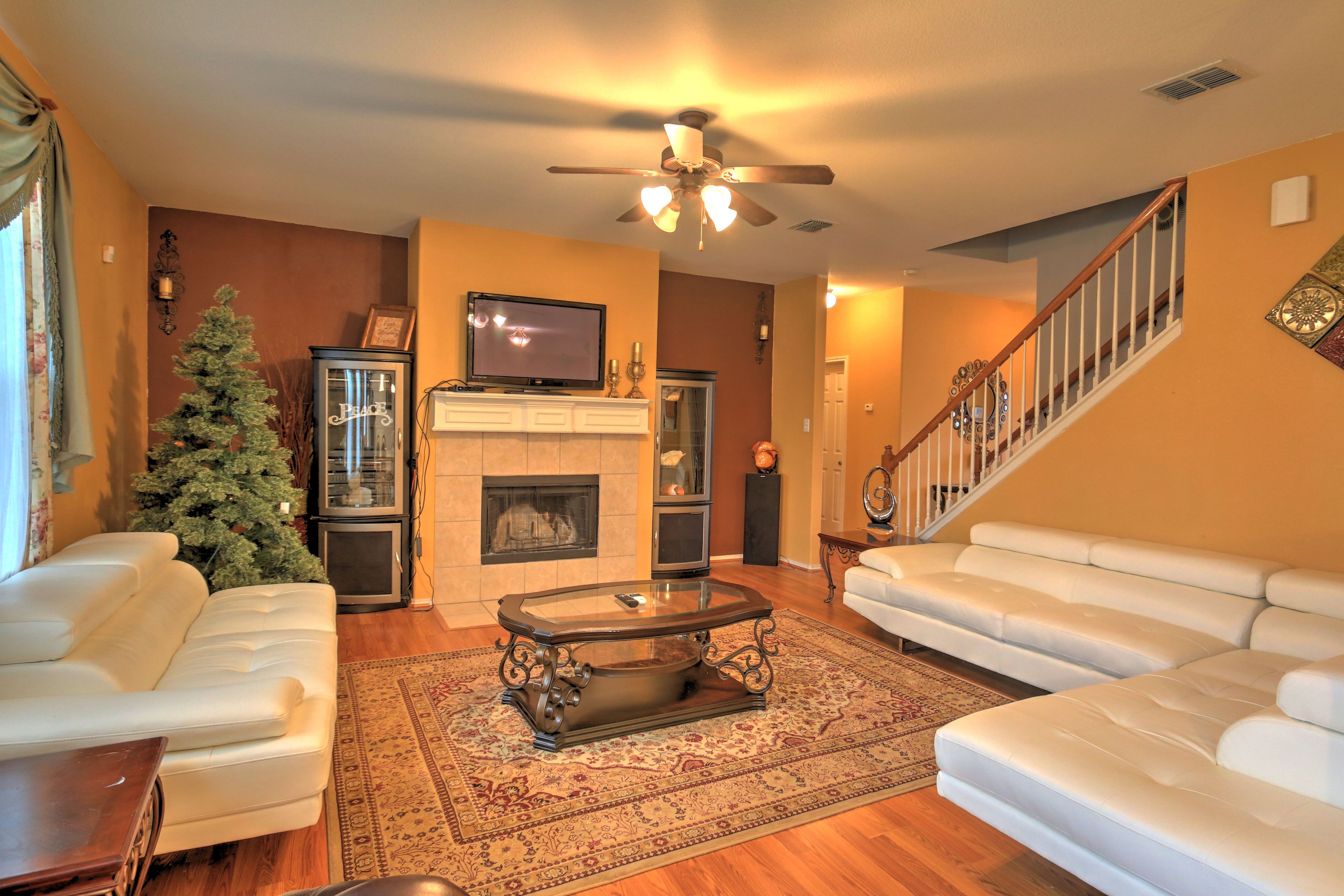 Relax in the leather sofas as you watch your favorite show on the TV.