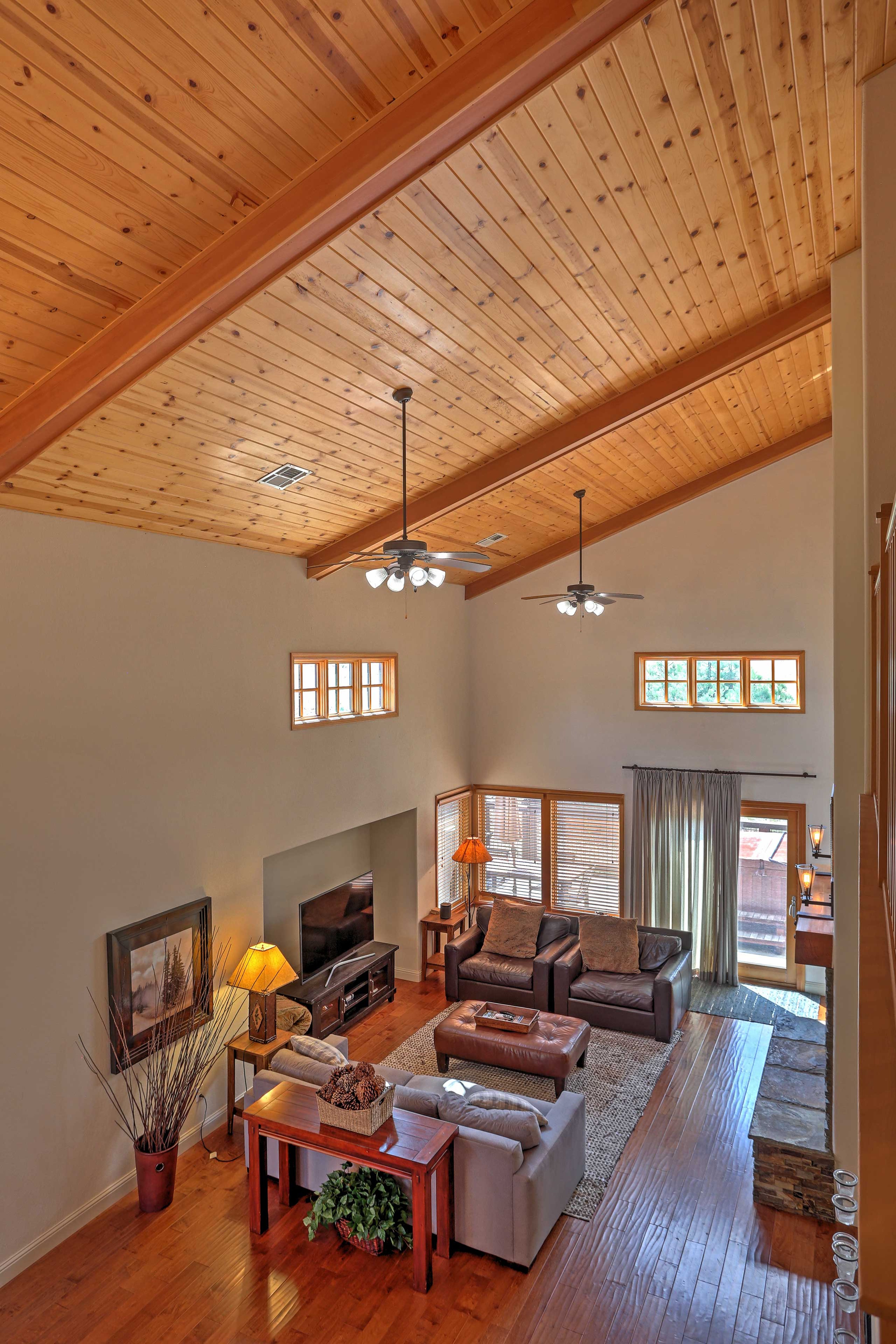 An open-concept layout allows those lounging in the living area to chat with the chef in the kitchen.