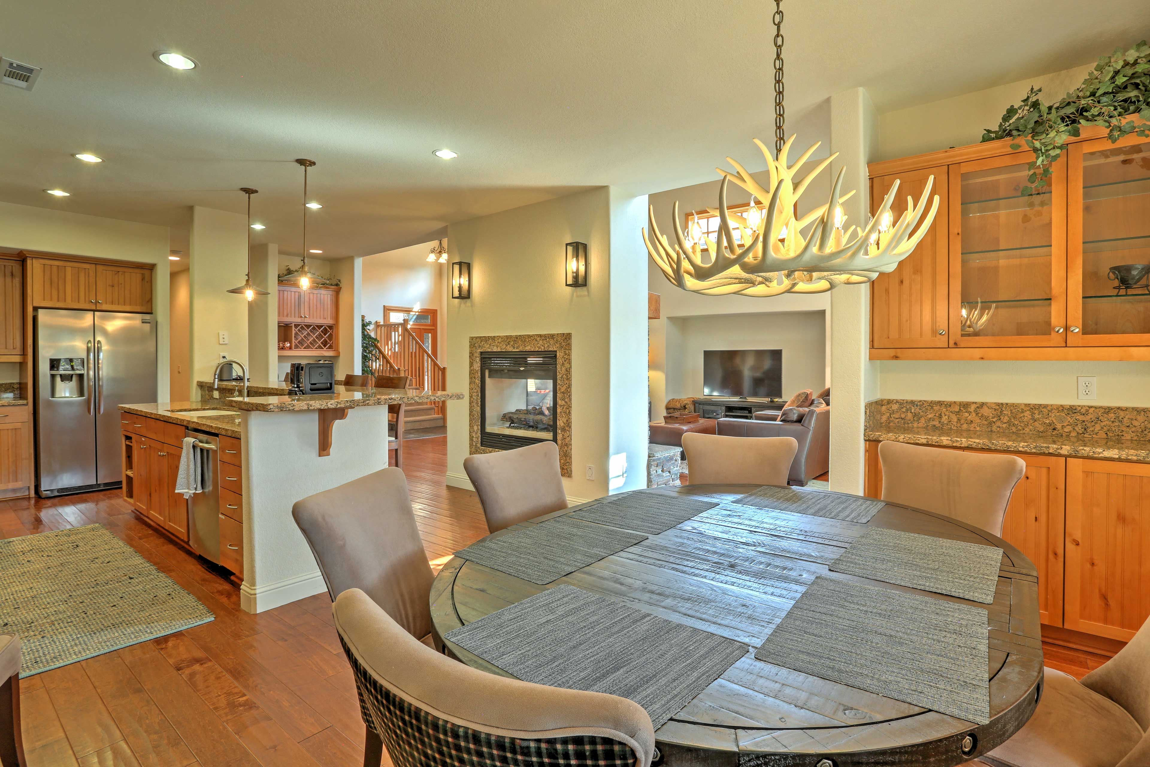 Gather your loved ones around this formal 6-person dining table for a delicious, home-cooked meal!