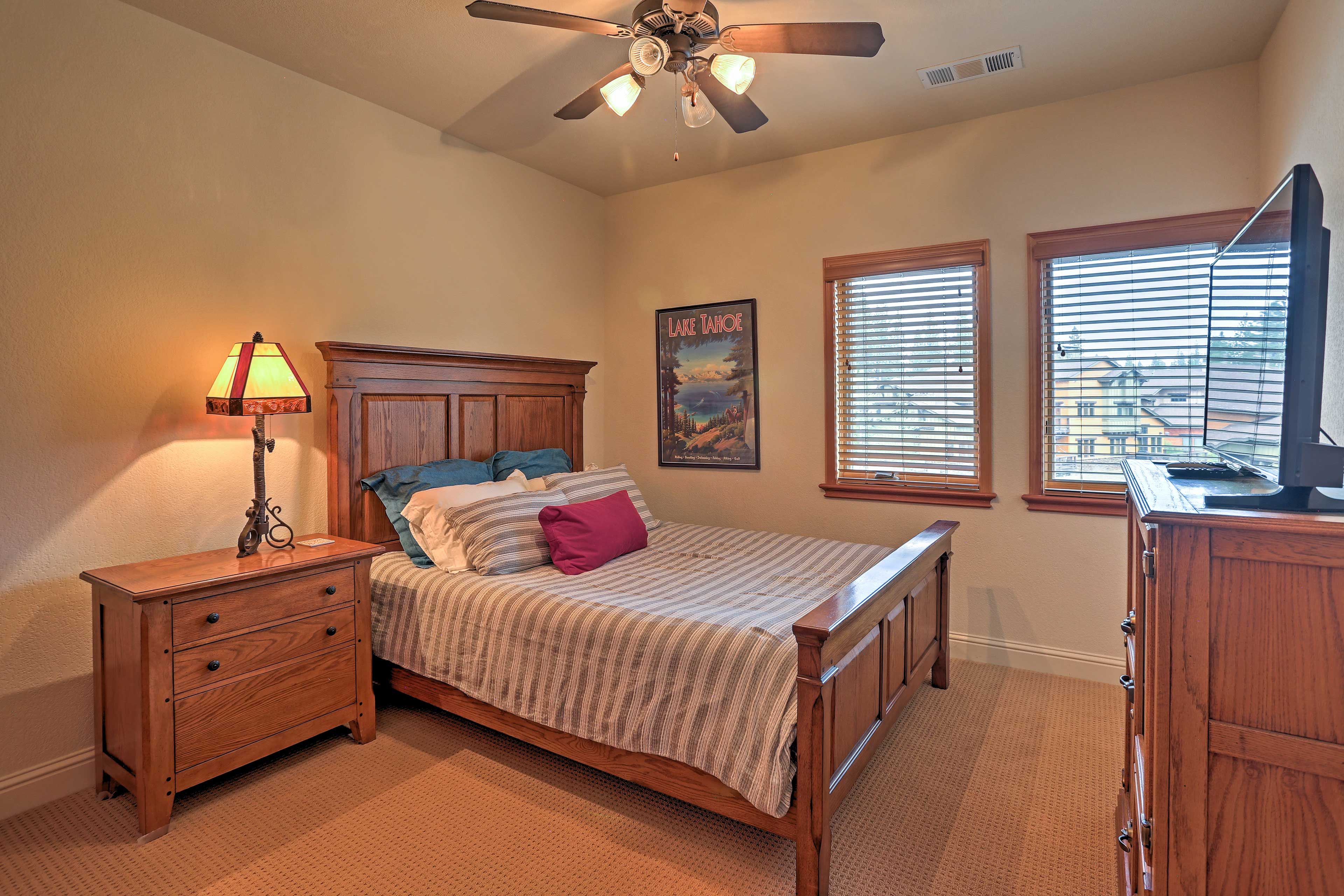 The second bedroom offers a cozy queen bed.