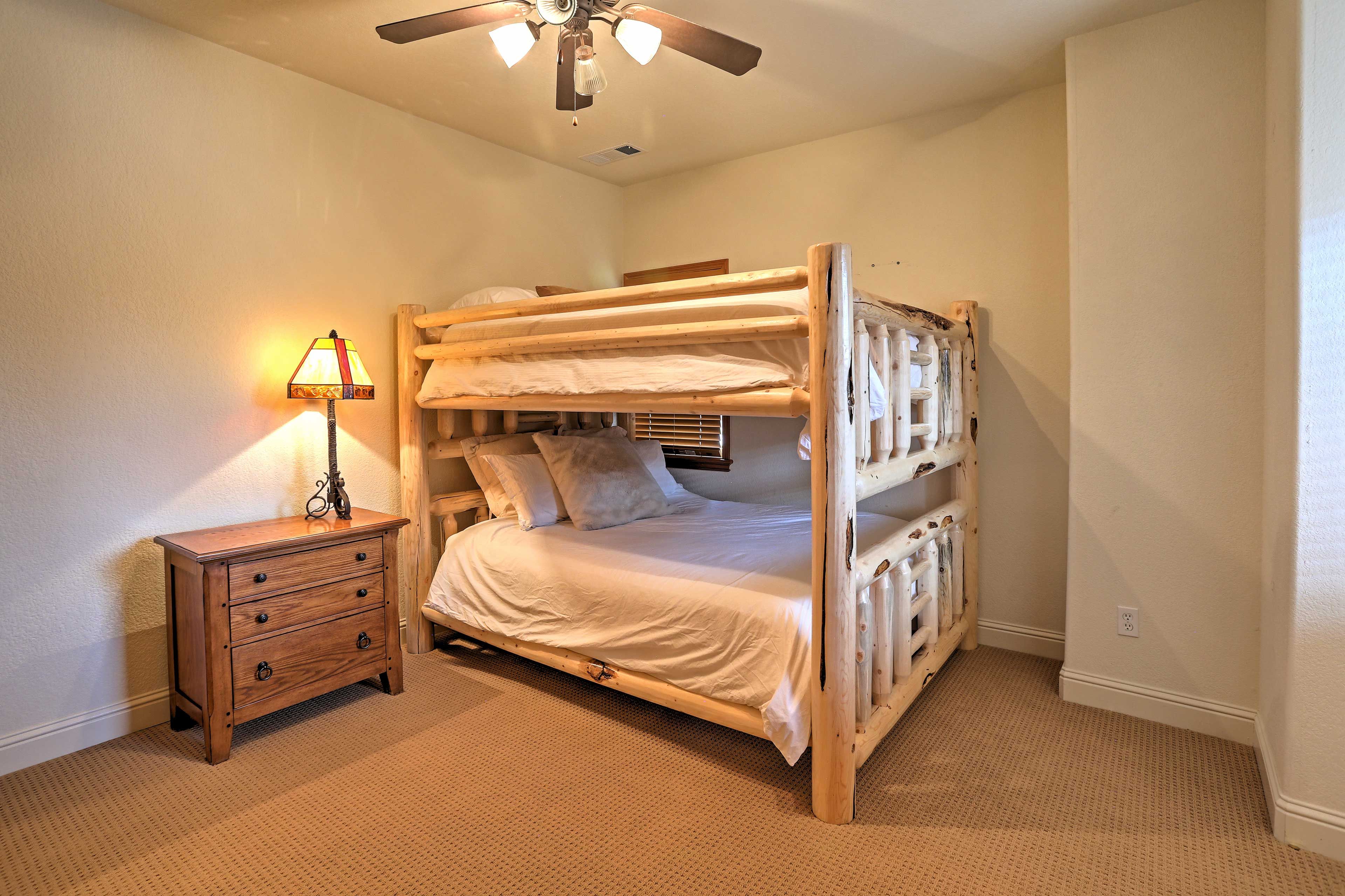 The third bedroom features a queen bunk bed.