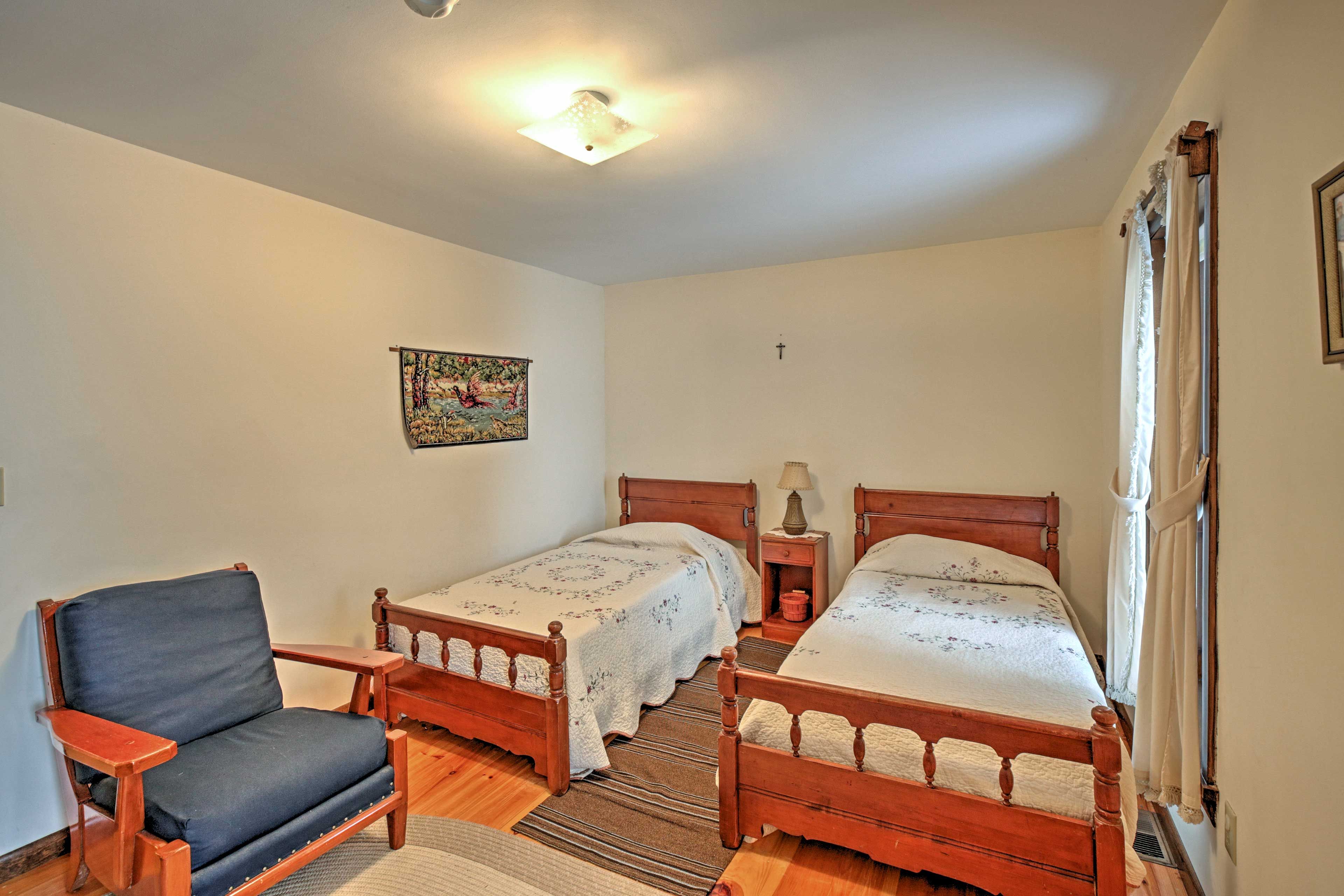 Sleep side by side in these twin beds.