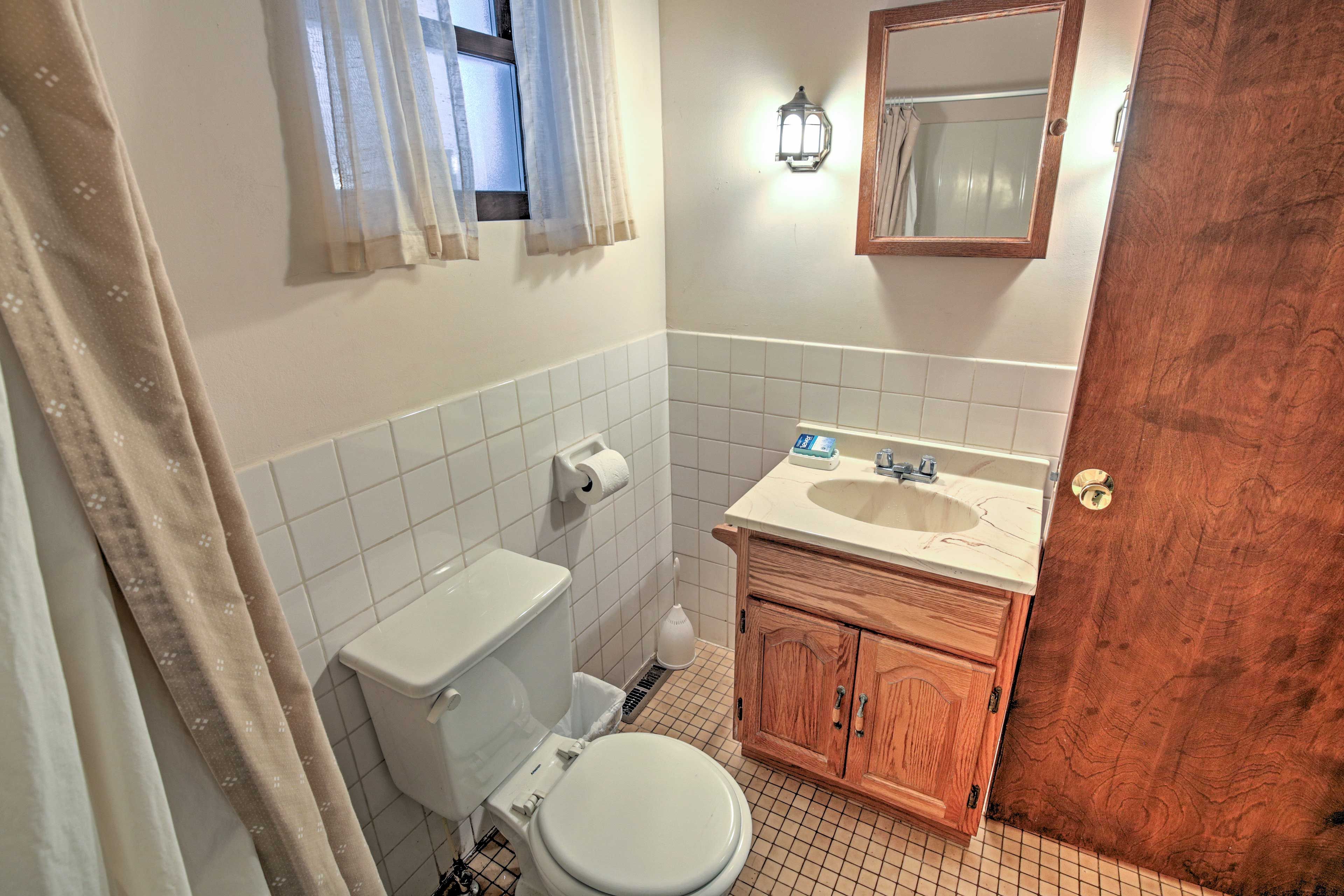 Freshen up for the day in this bathroom.