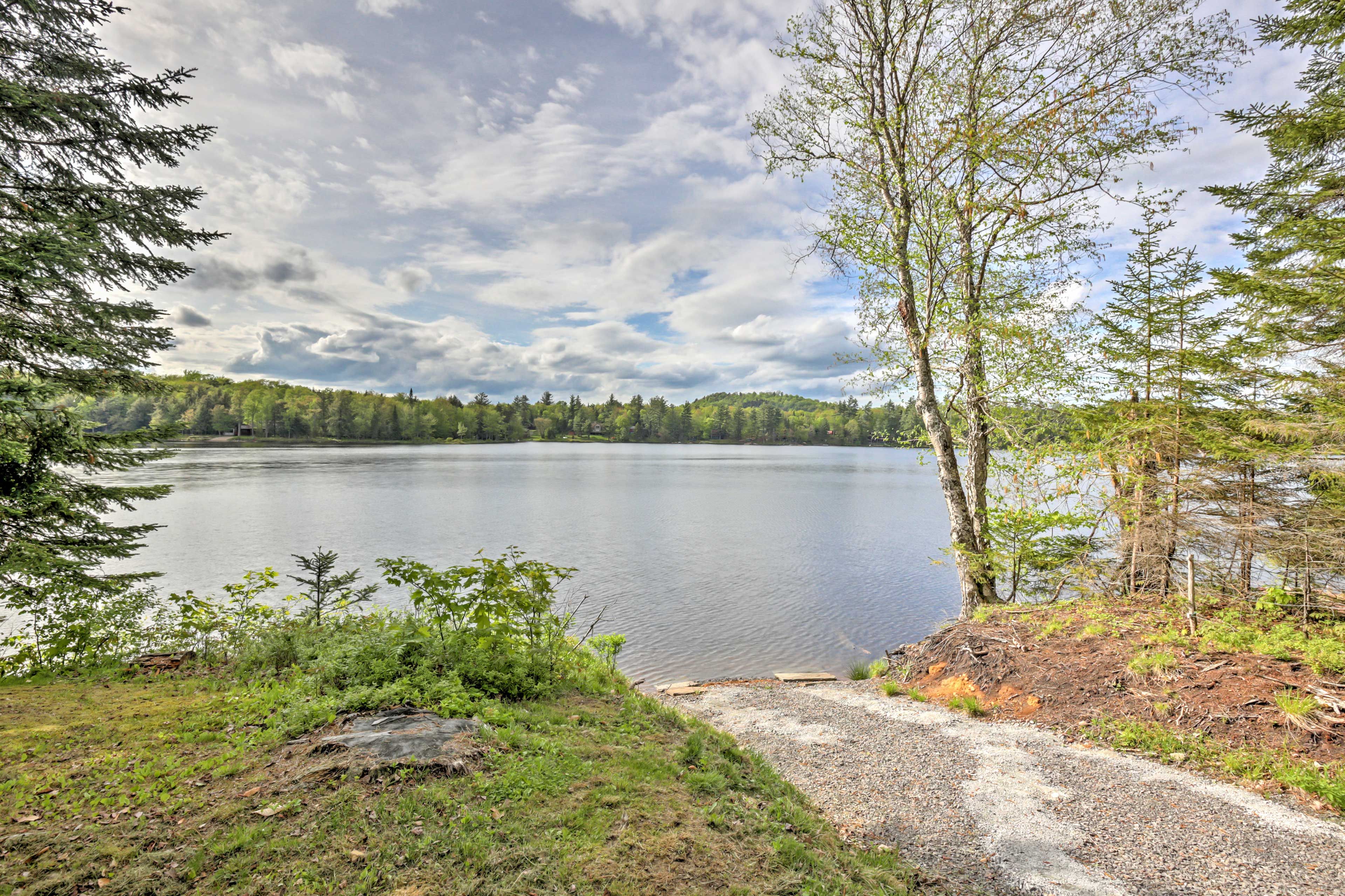 Escape to the peace & quiet of the Adirondacks at this lakefront Old Forge home.