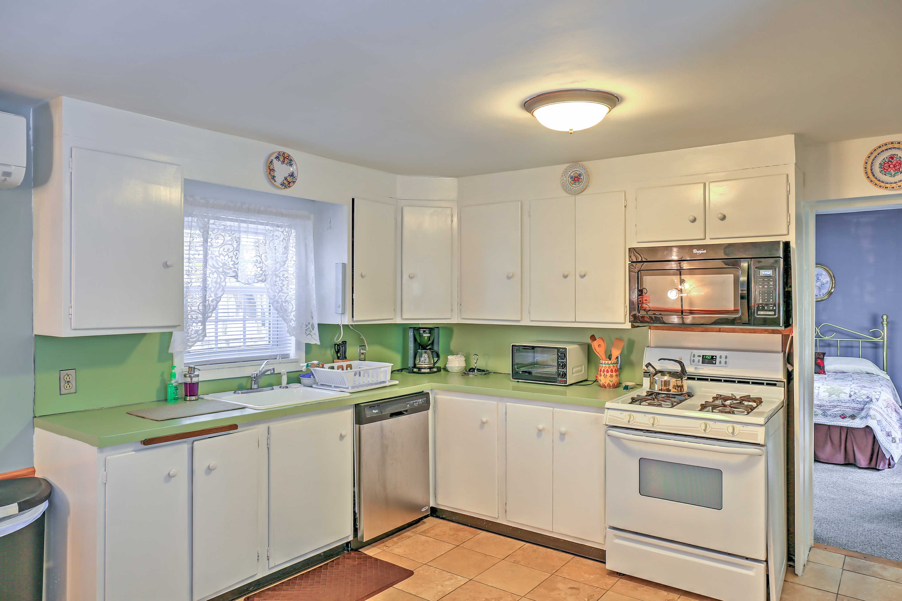 Prepare delicious home-cooked meals in the fully equipped kitchen.