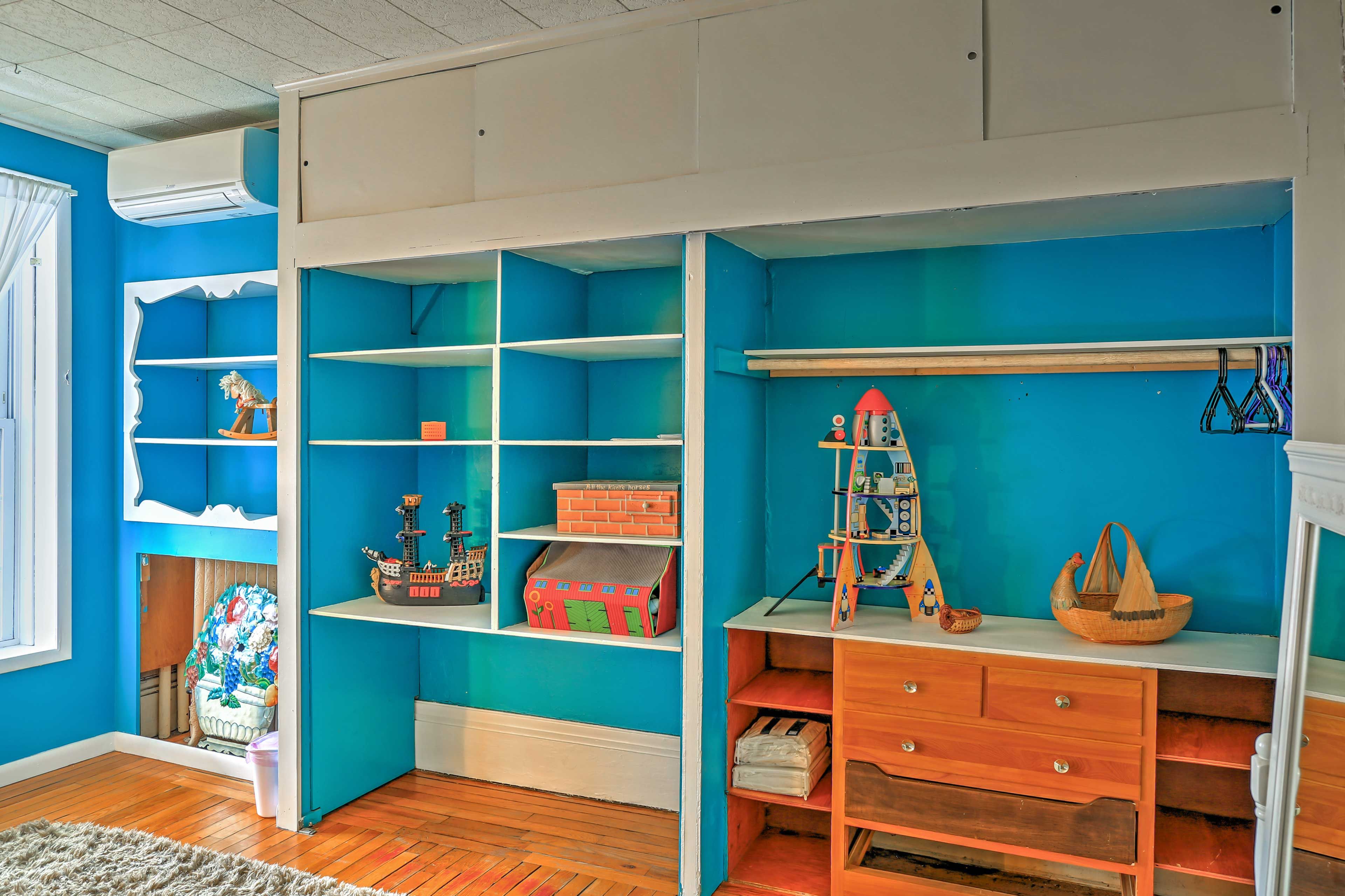 This room is brightened by vibrant blue walls!