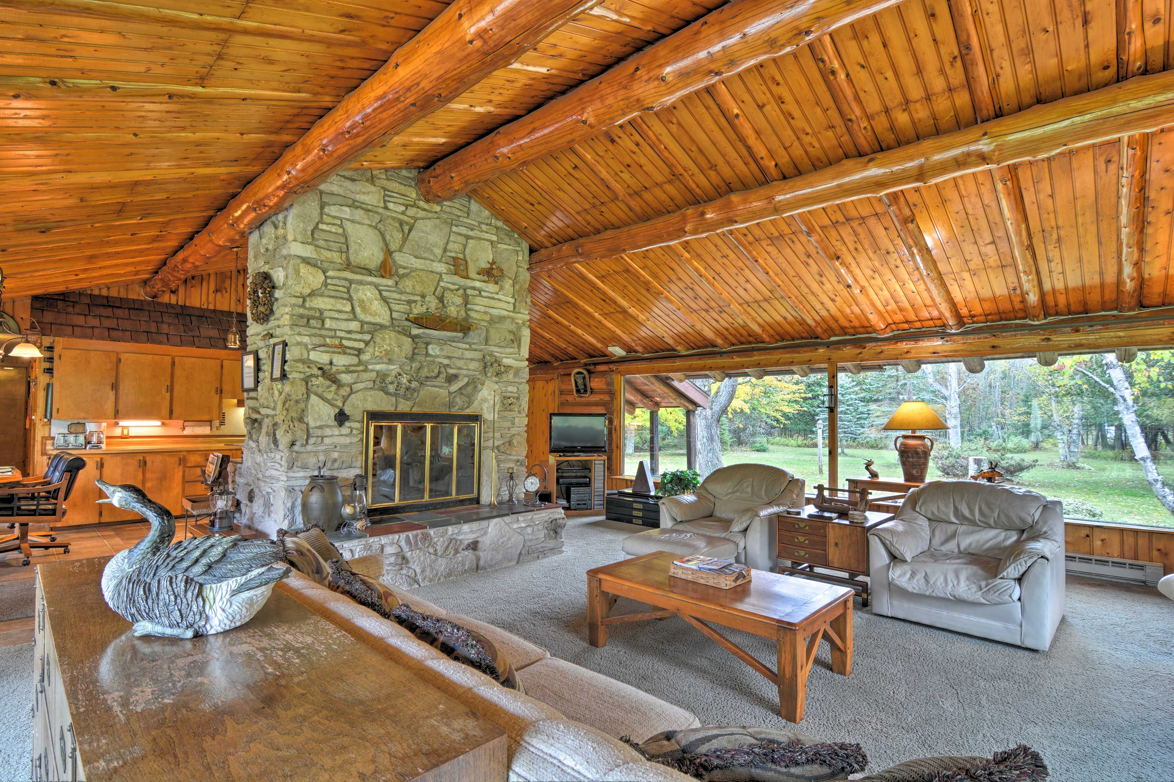 Cozy up to the wood-burning fireplace in the main house to stay warm!