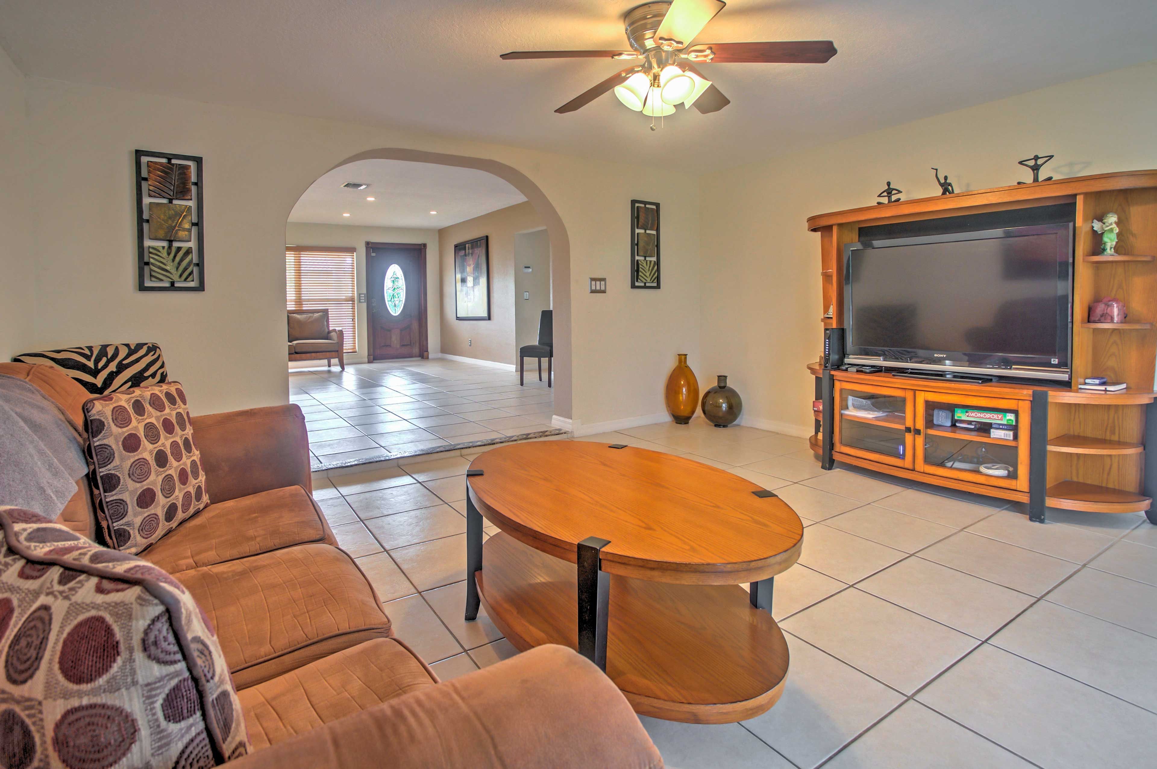 Lay on the couch and watch your favorite shows on the 46-inch flat screen cable TV.