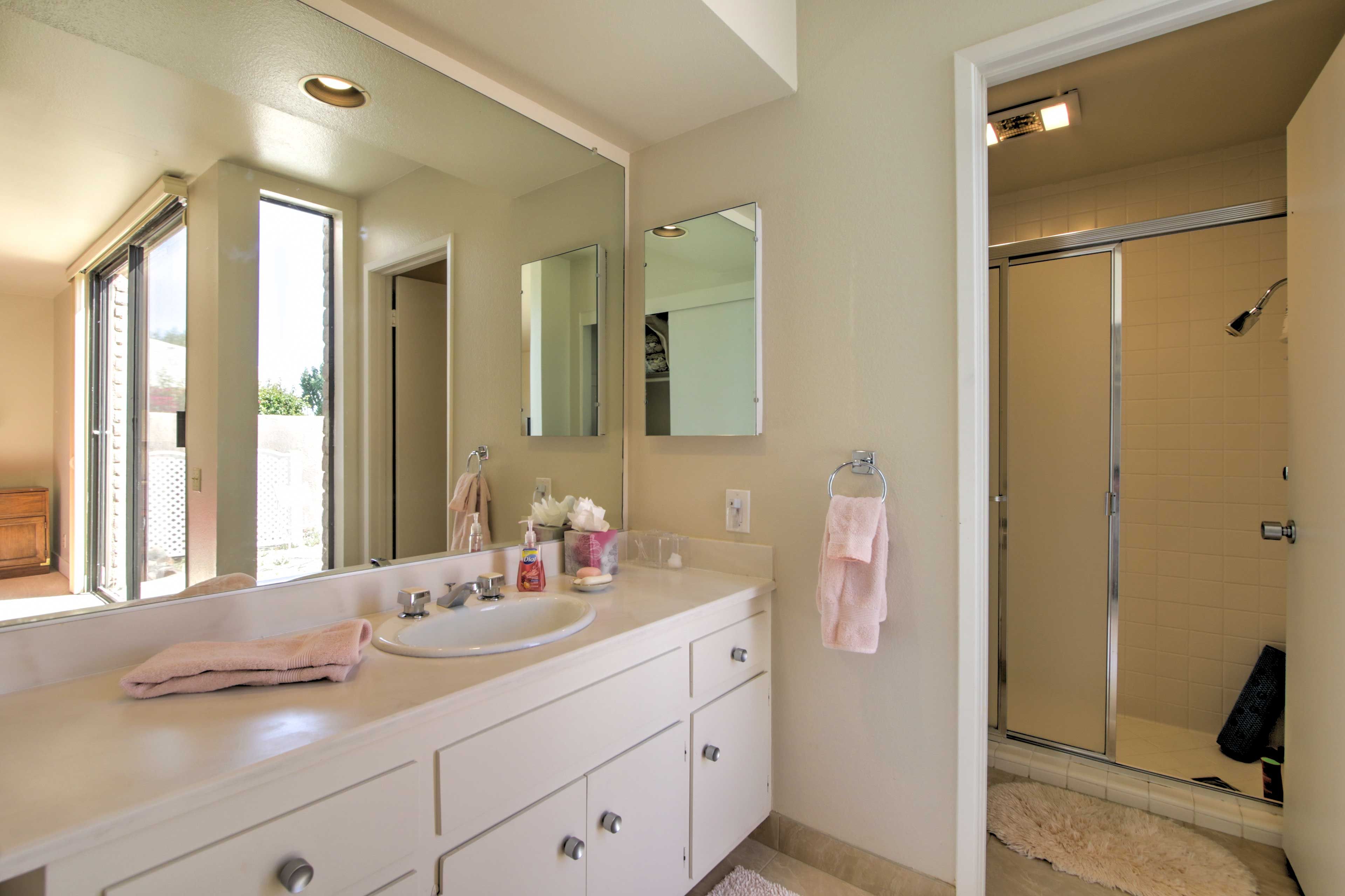 Freshen up in the second en-suite bathroom equipped with a walk-in shower.