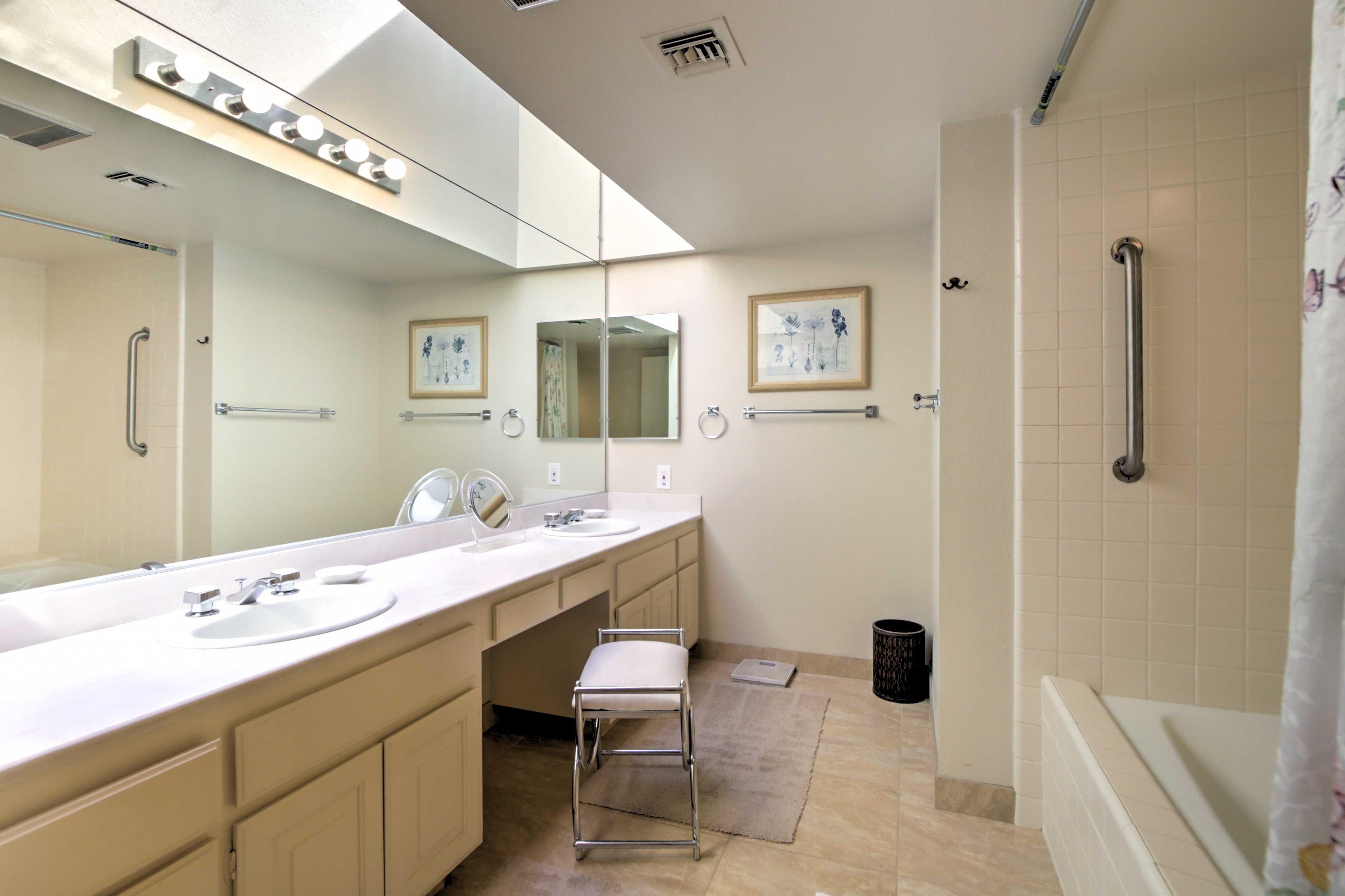 Freshen up in the en-suite bathroom complete with a shower/tub combo.