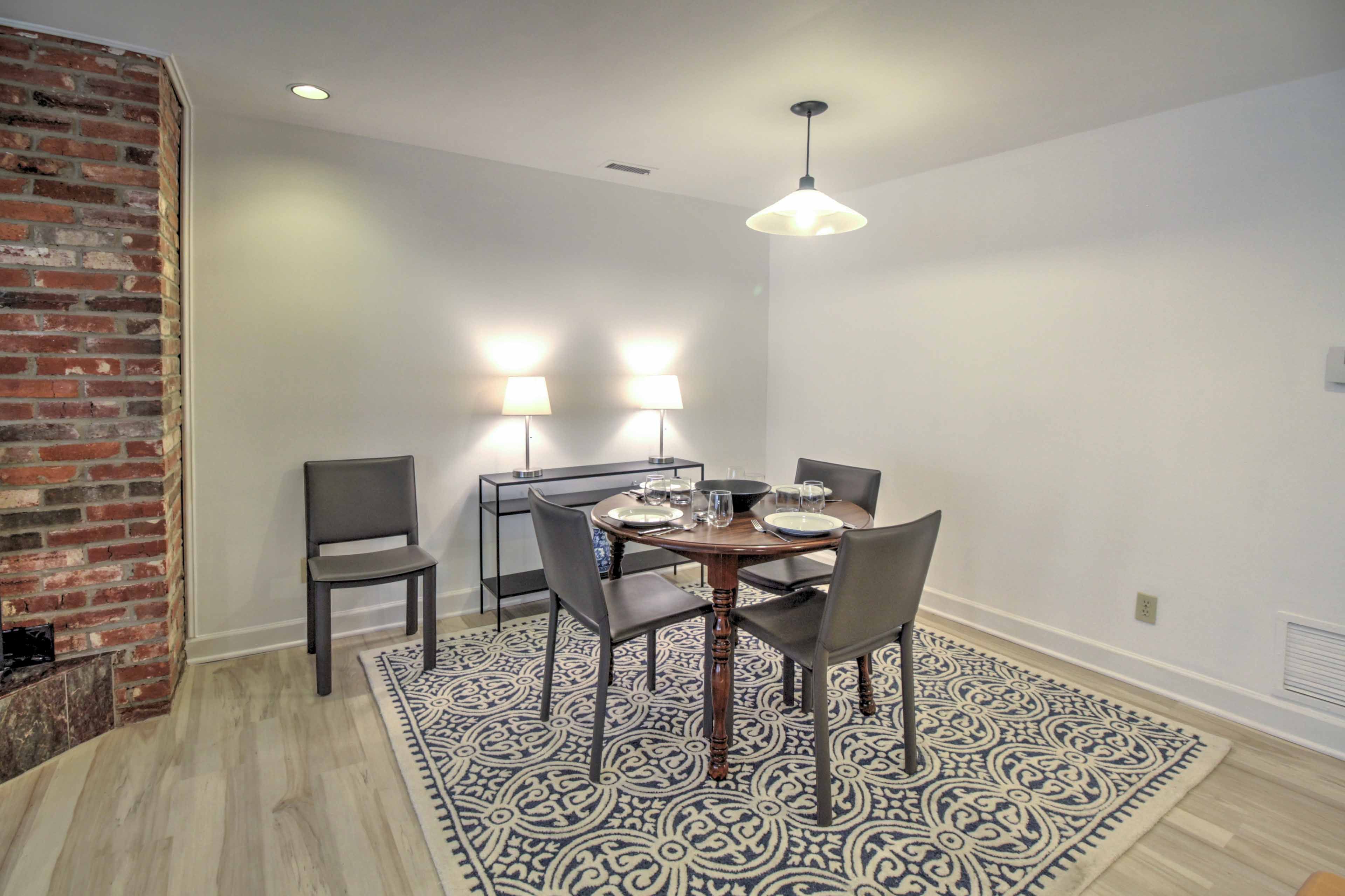 Gather around the dining table to enjoy your meals.