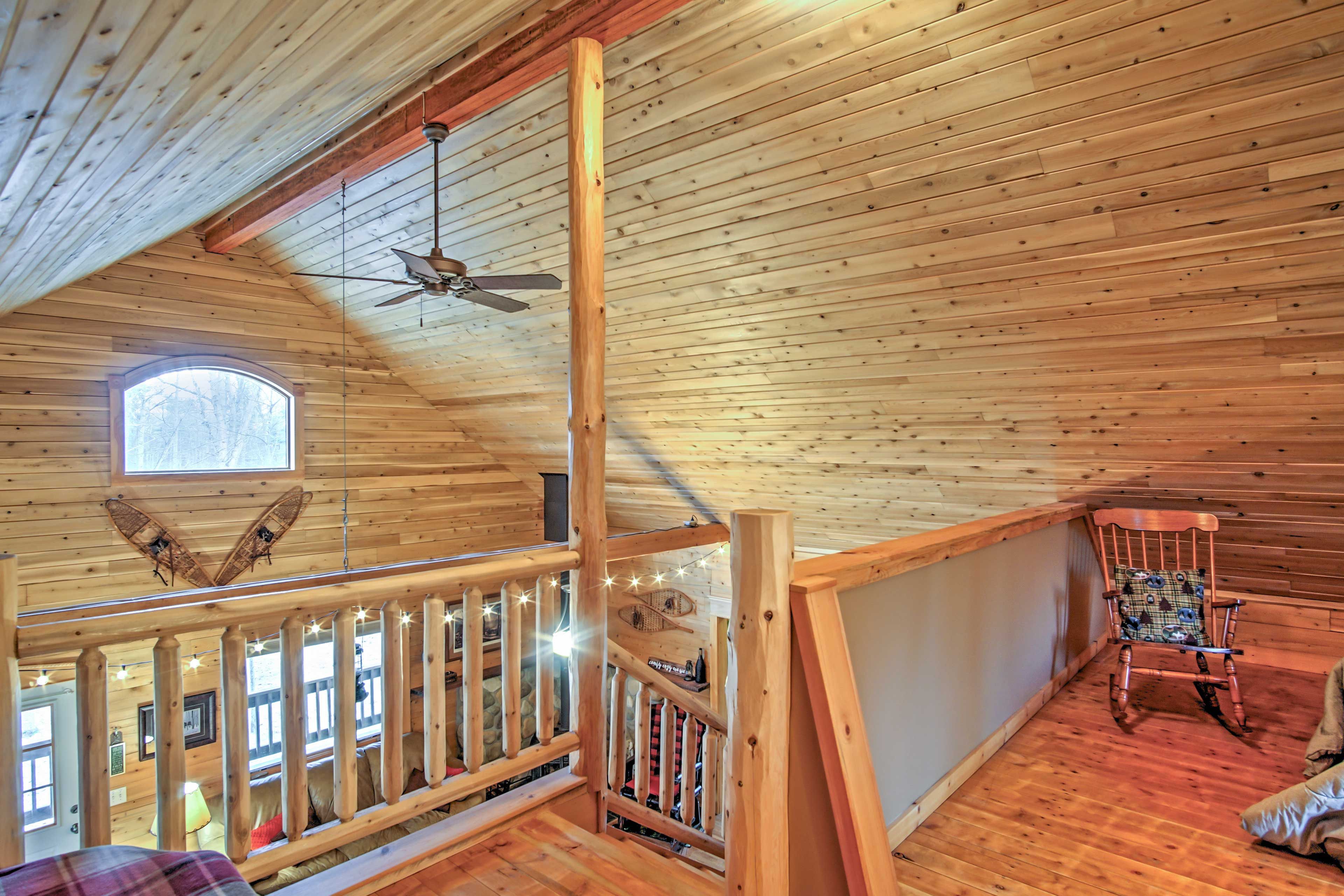 Wood siding extends all the way the cathedral ceilings.