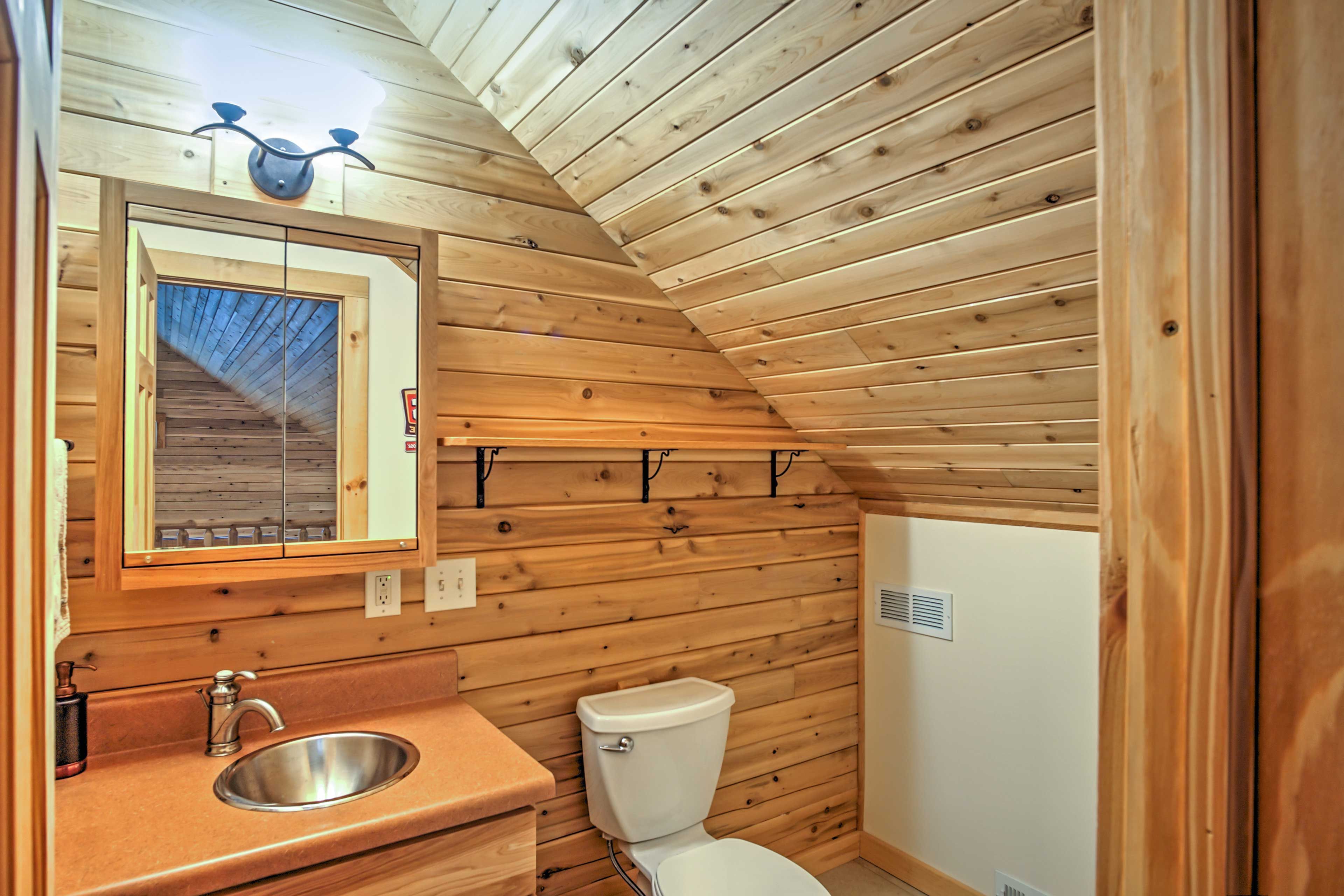 The loft area is also complete with its own half bathroom.