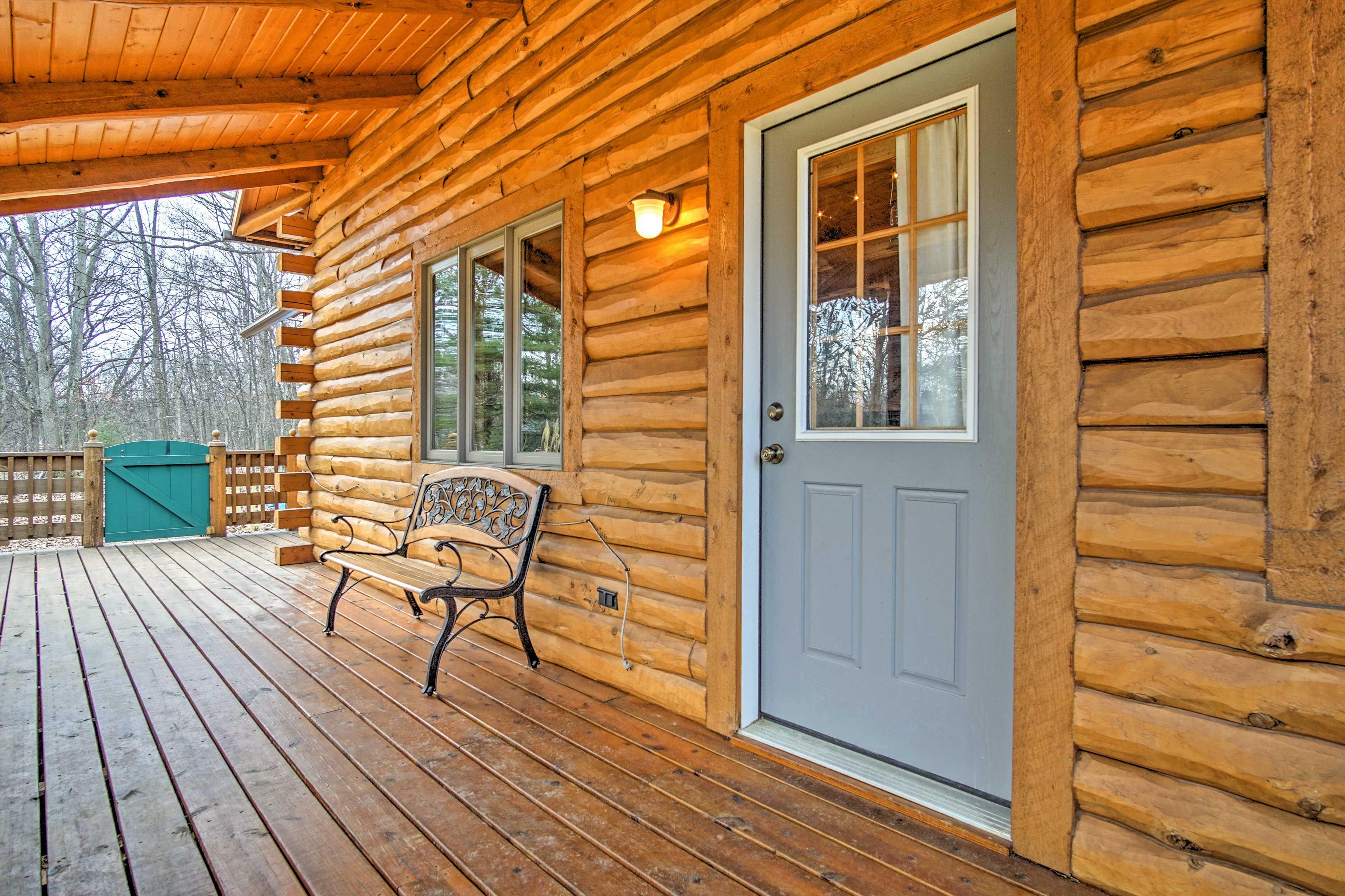 Enjoy morning coffee on the covered deck.