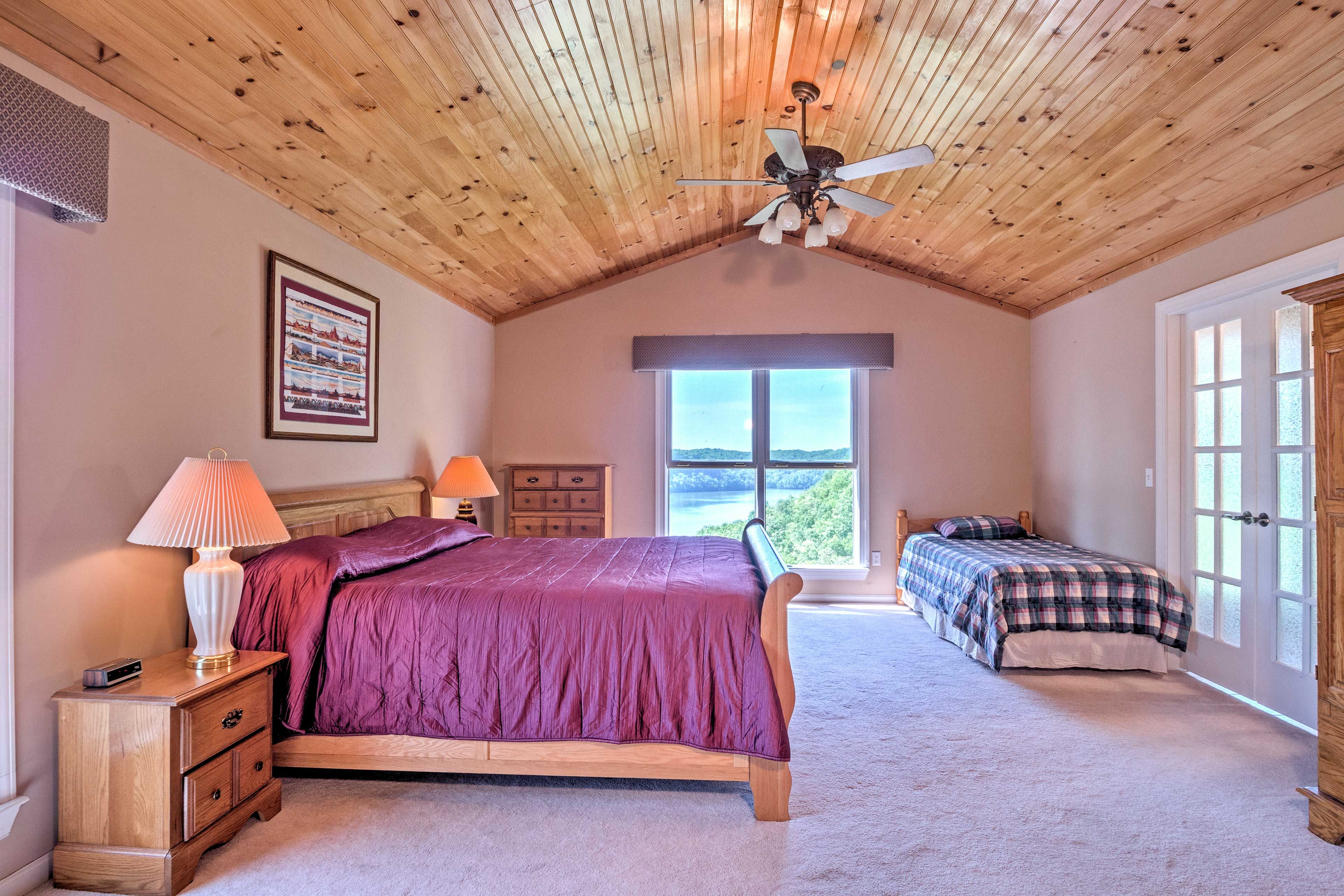 This bedroom boasts a king bed and twin bed.