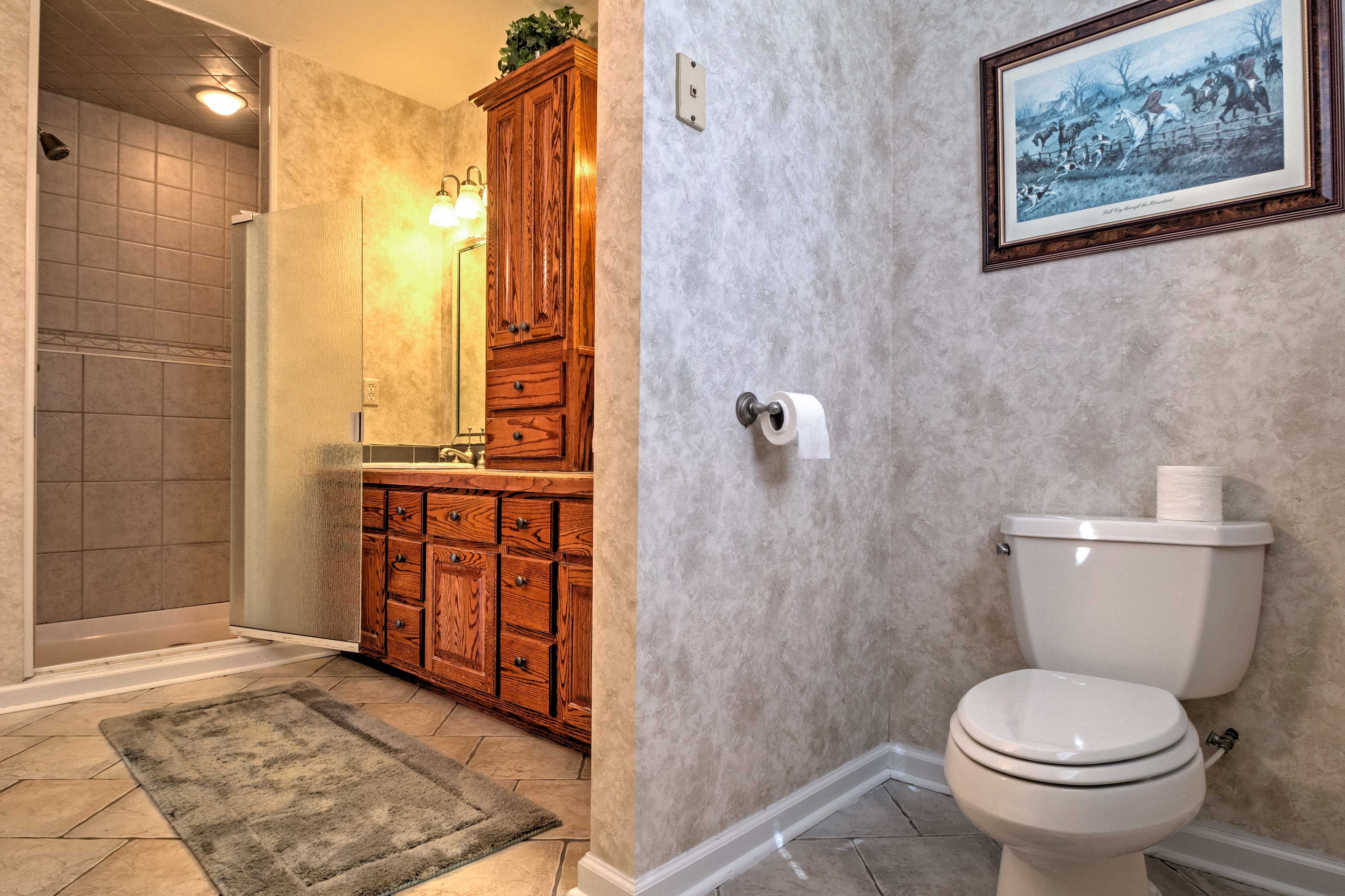 The bedroom also features this private en suite bathroom.