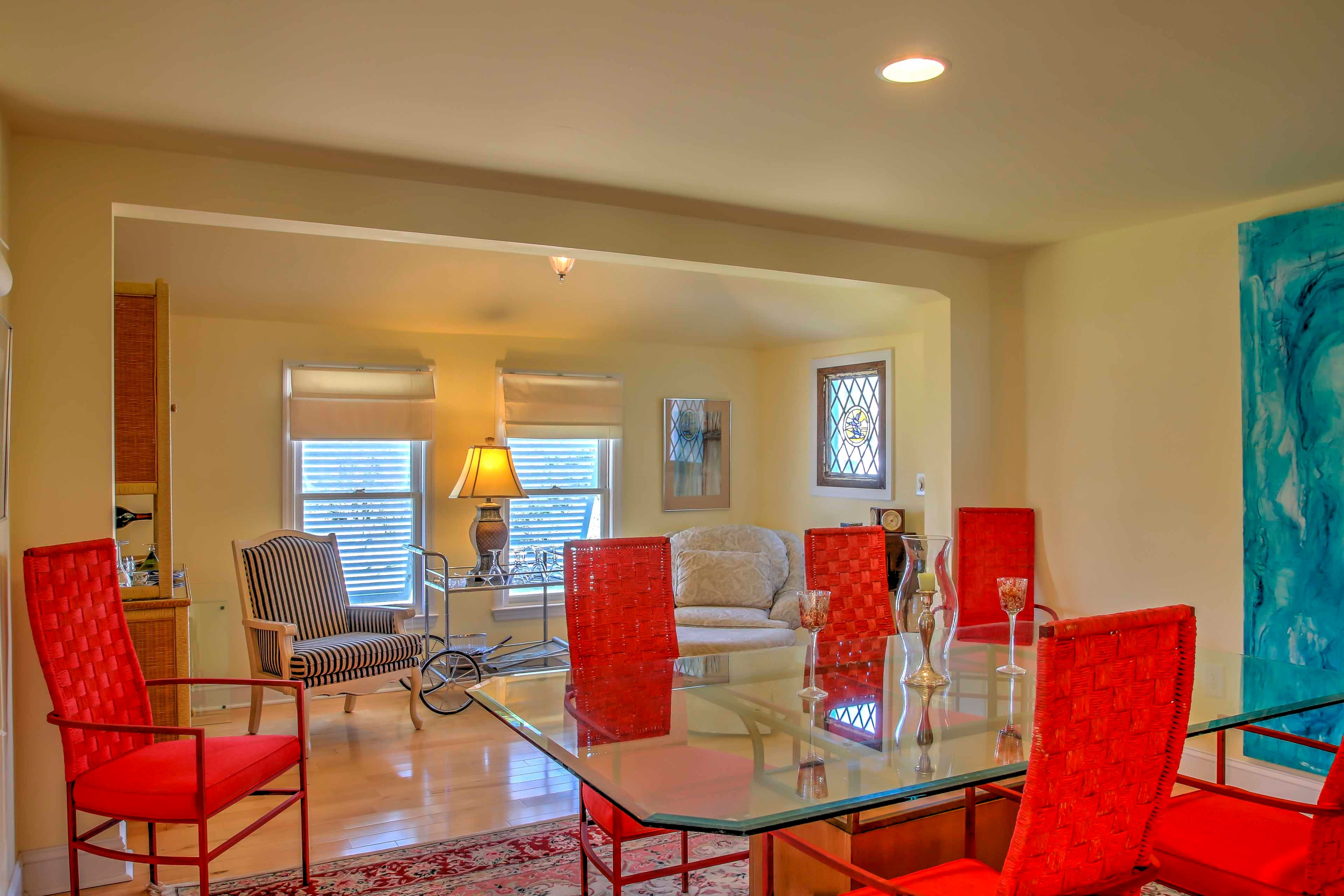 Gather around the dining table with seating for 6 to enjoy more formal meals.