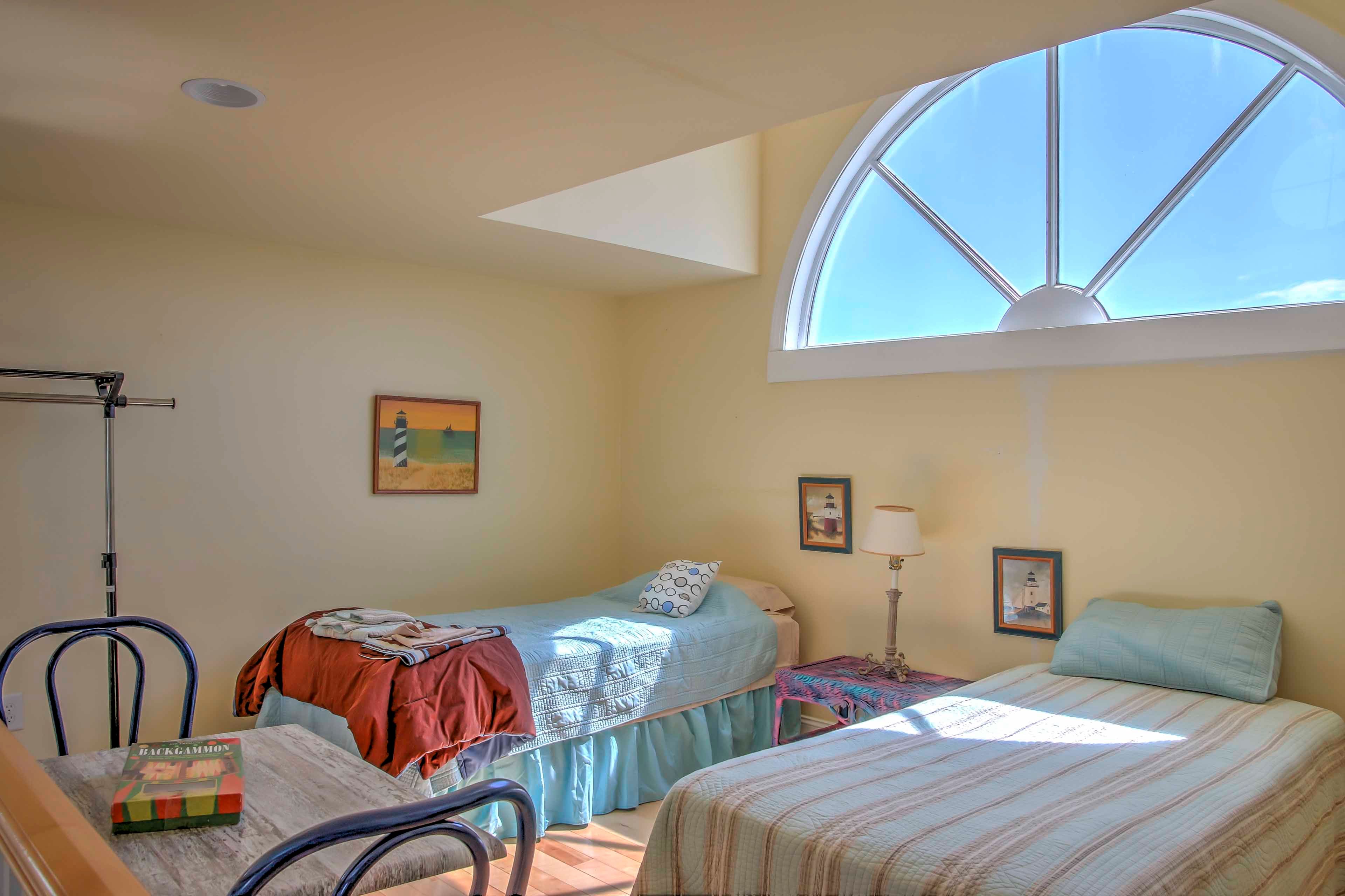 With 2 twin beds, games, DVD player, and table, the loft is made for kids!